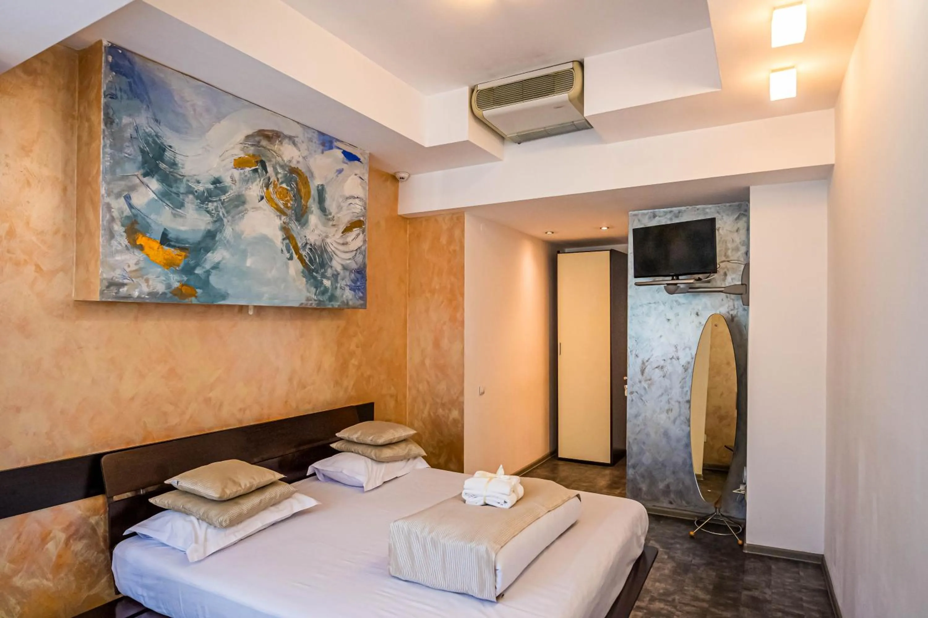 Bed in Do Stil Boutique Hotel