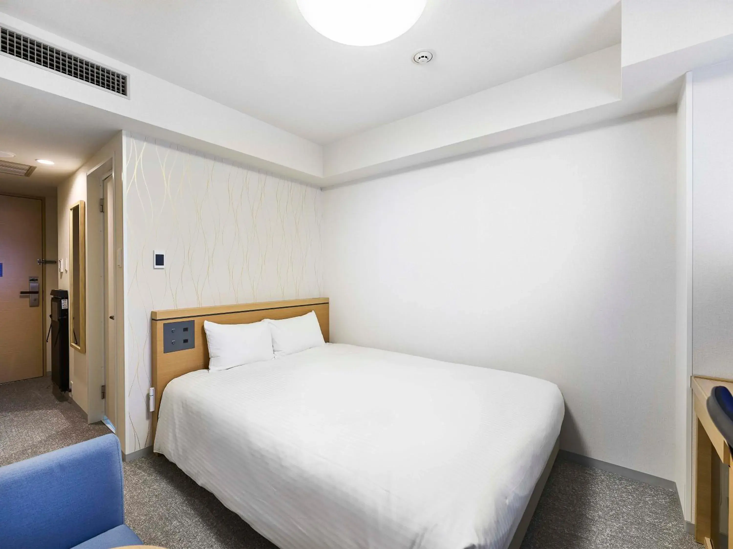 Bed in Daiwa Roynet Hotel Naha Kokusaidori Bed in Daiwa Roynet Hotel Naha Kokusaidori