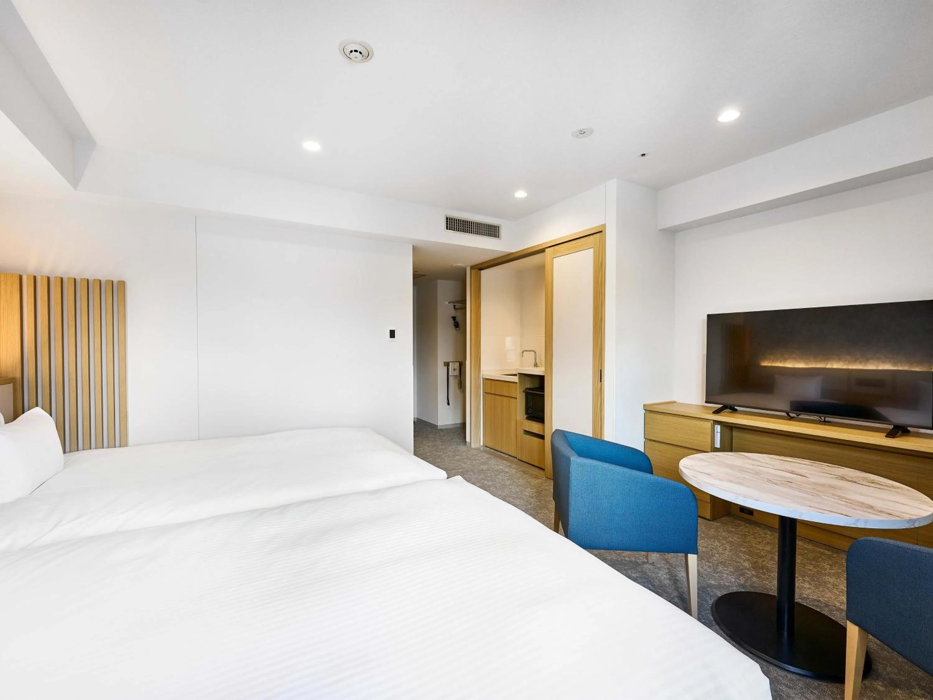 Bed in Daiwa Roynet Hotel Naha Kokusaidori