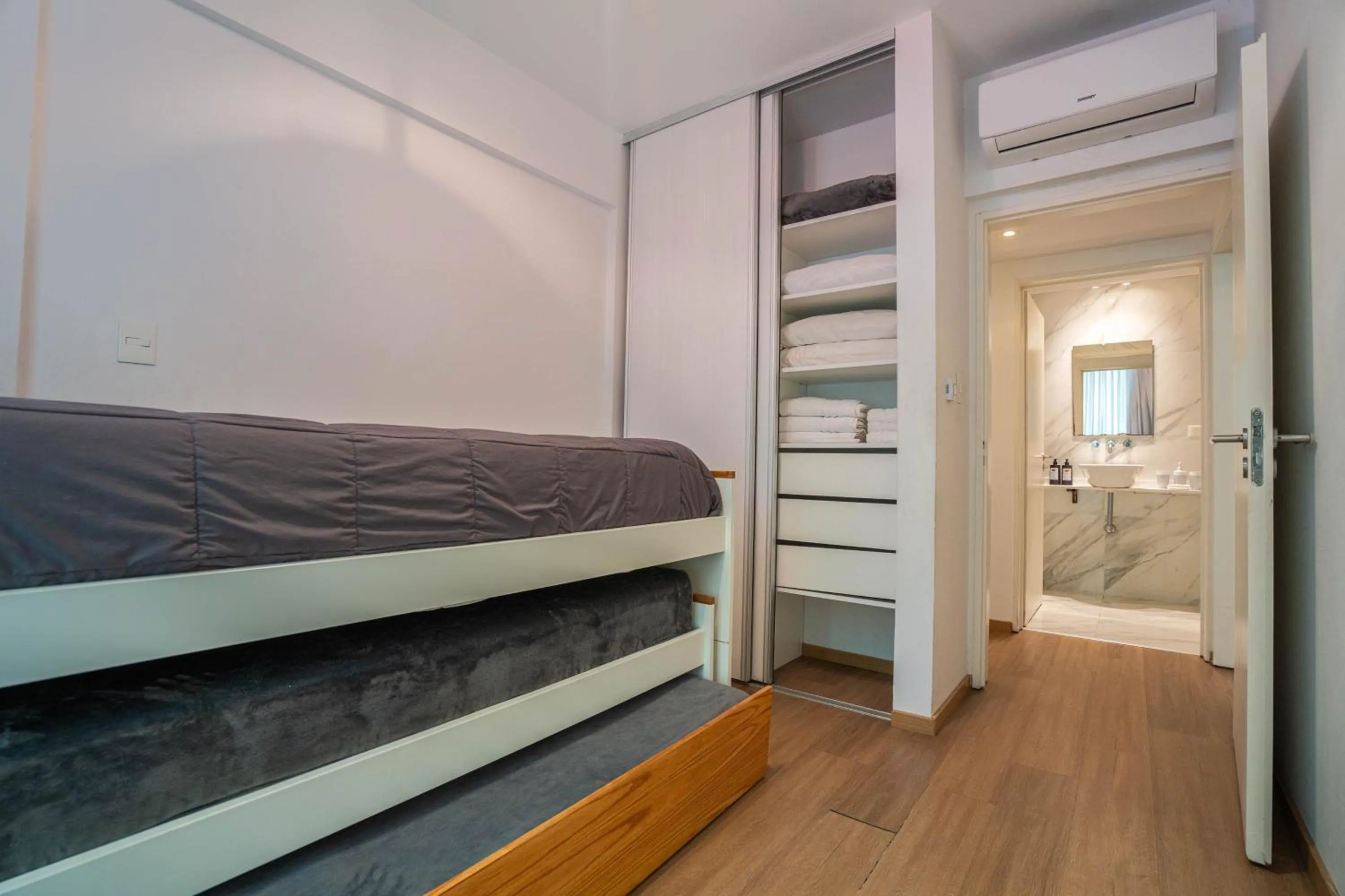 Bed in Monroe Suites