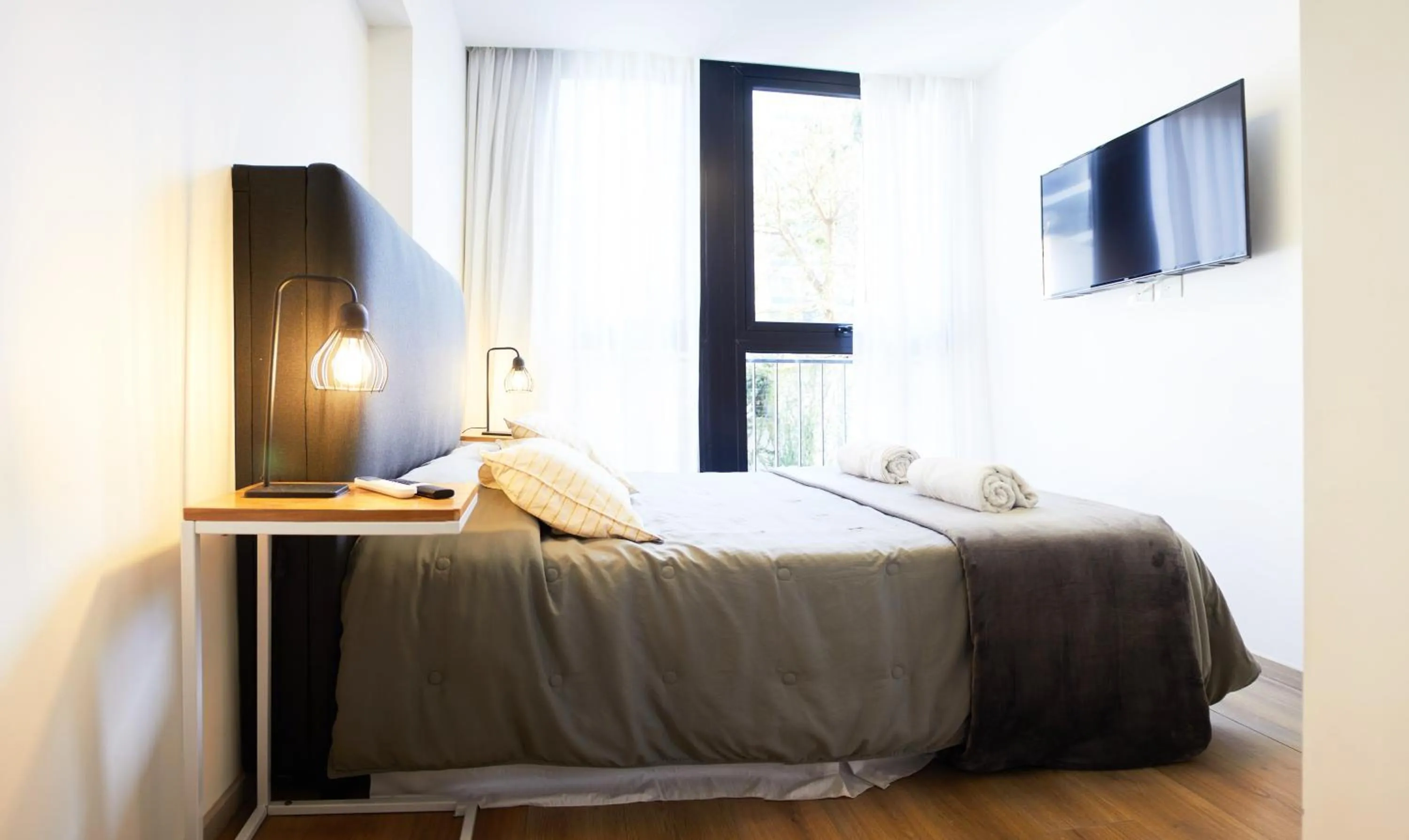 Bed in Monroe Suites