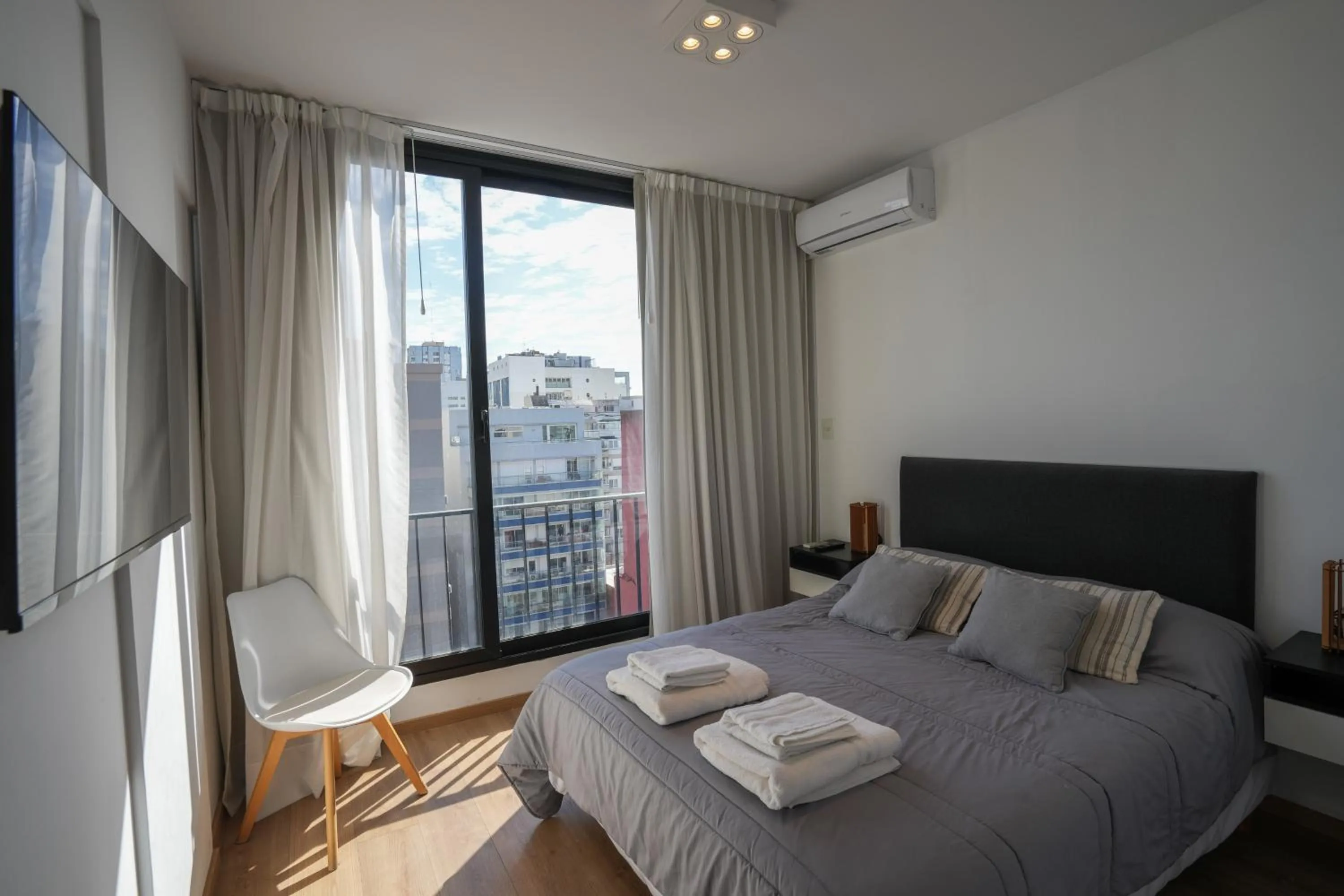 Bed in Monroe Suites