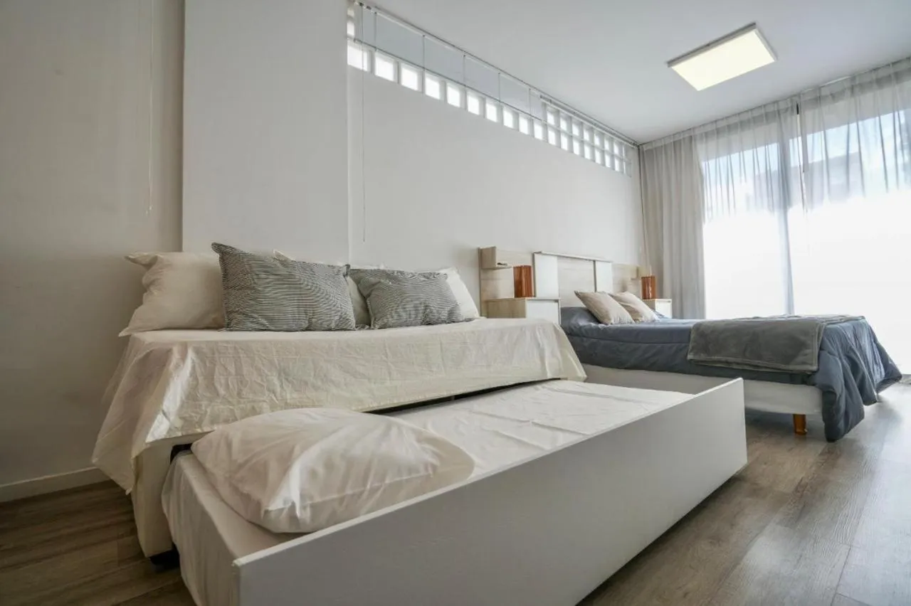 Bed in Monroe Suites