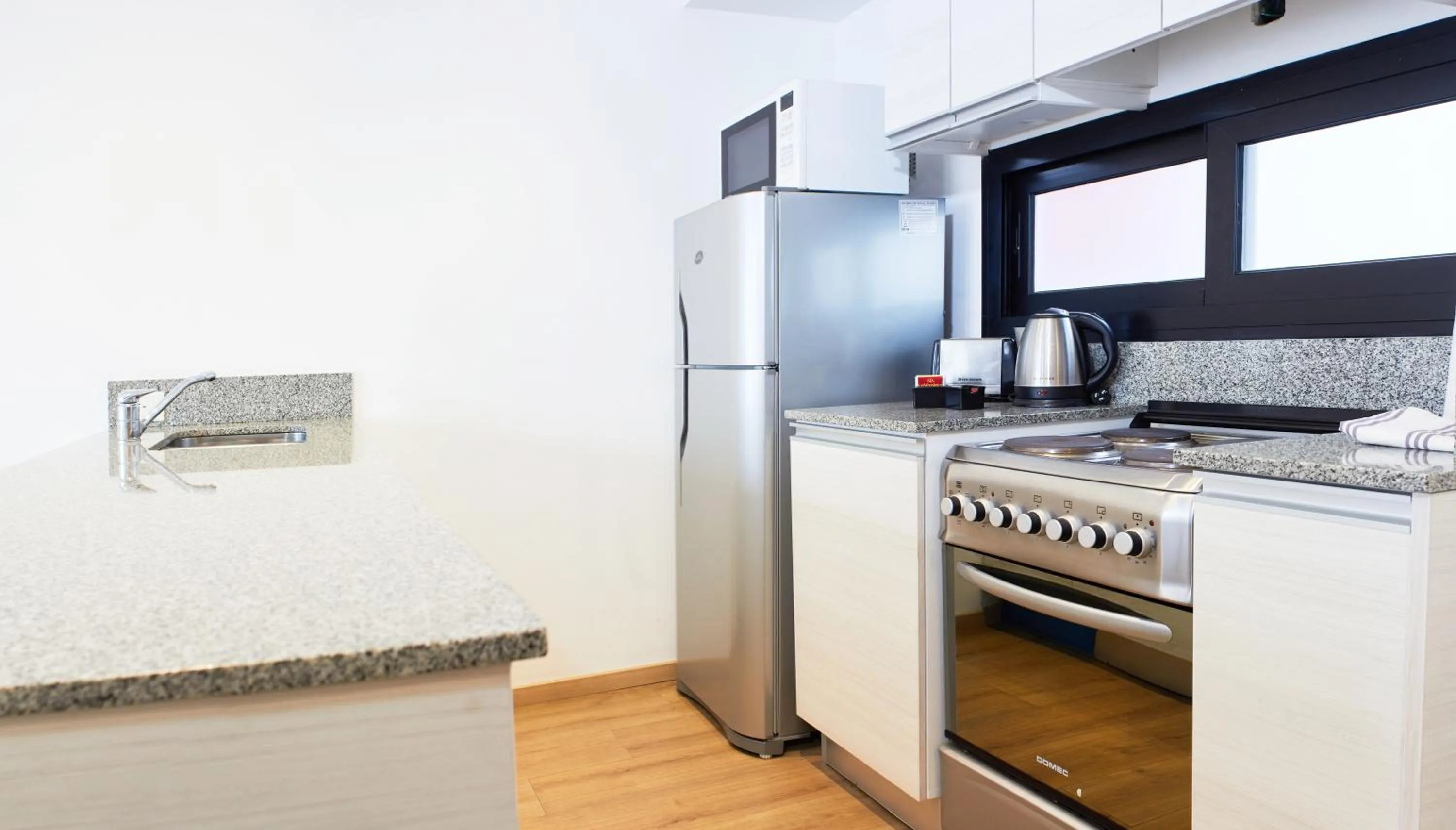 kitchen in Monroe Suites