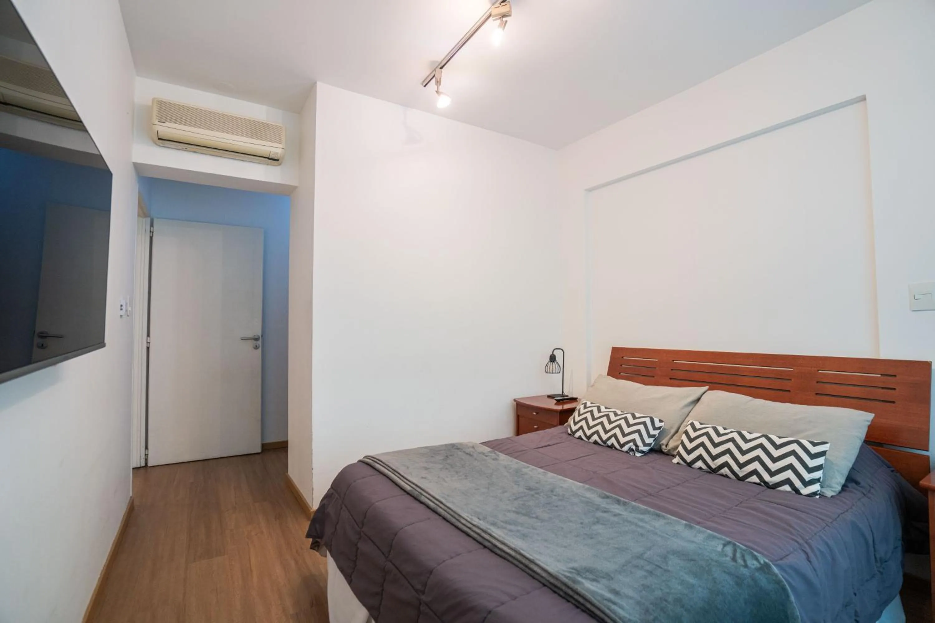 Bed in Monroe Suites