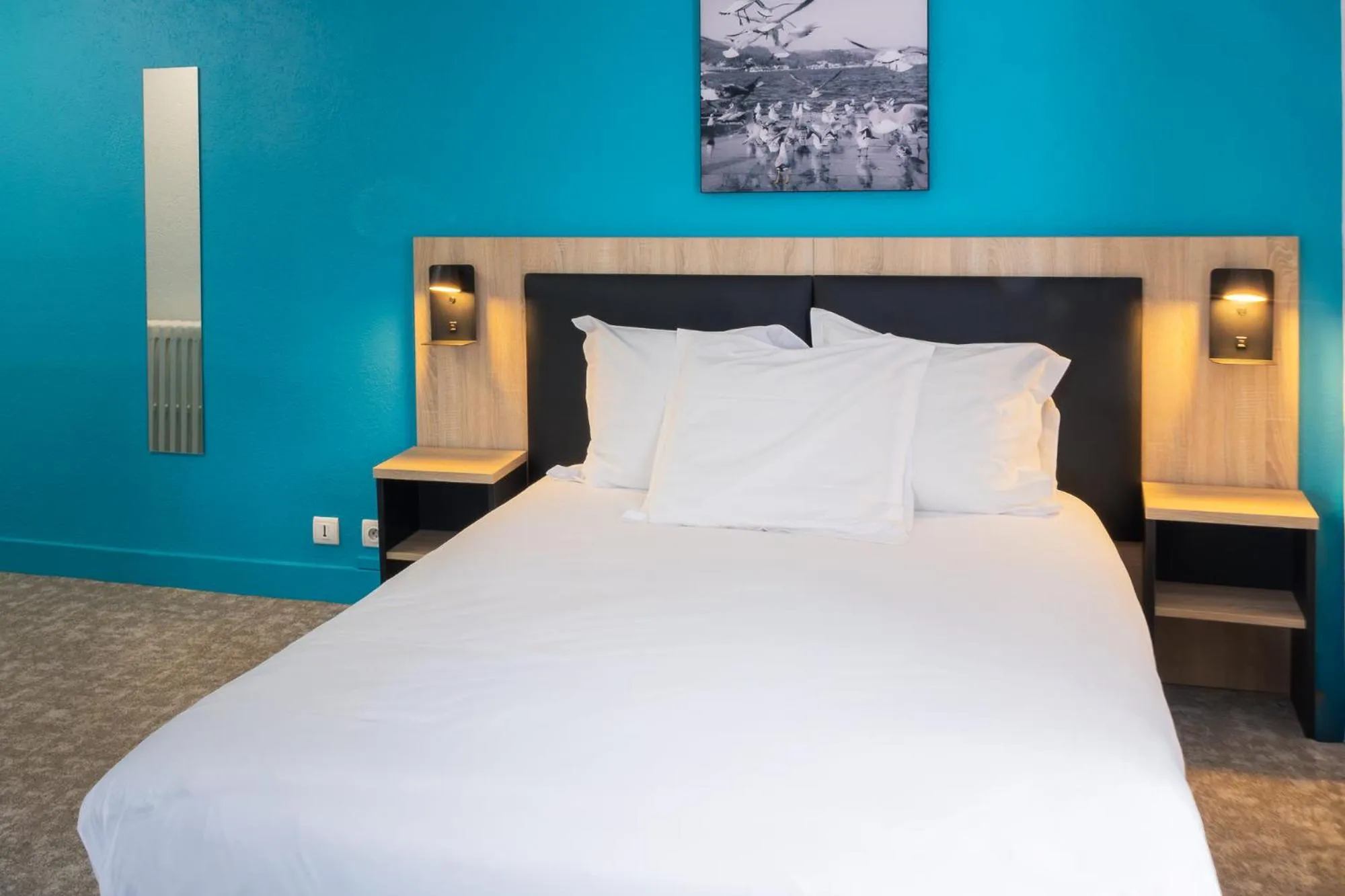 Bed in Hôtel de France - Le Patriarche