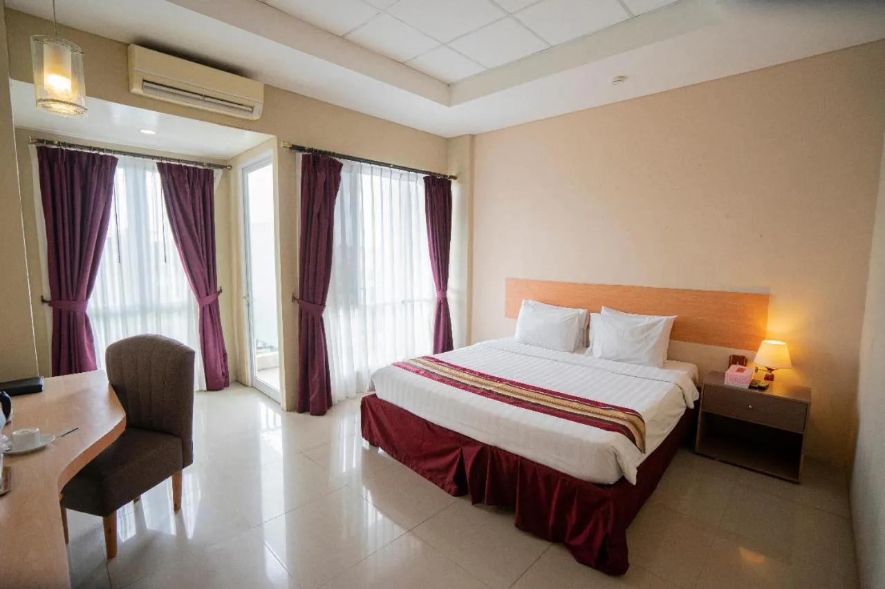 Bed in Bangka City Hotel