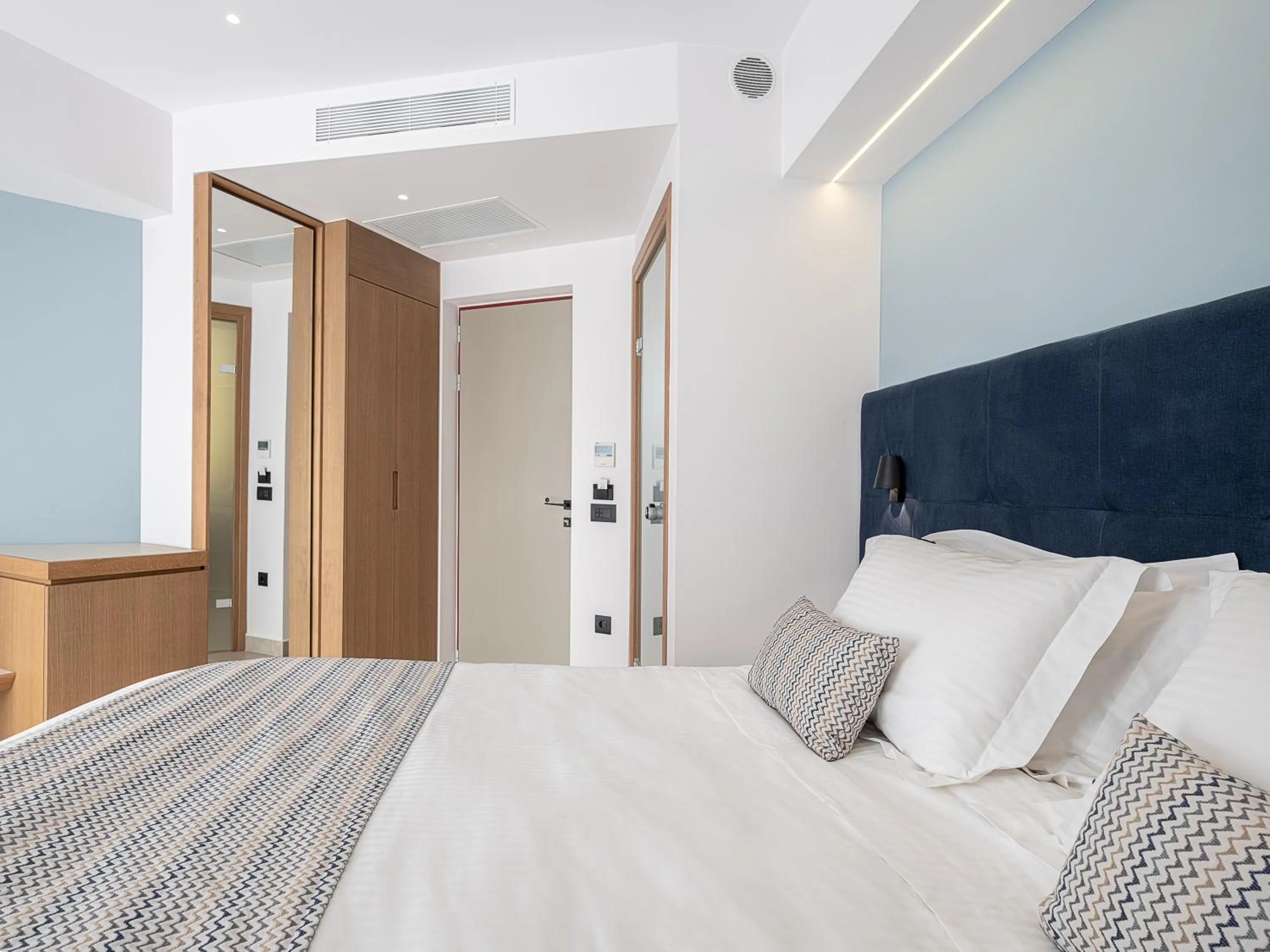 Photo of the whole room, Bed in M City Hotel