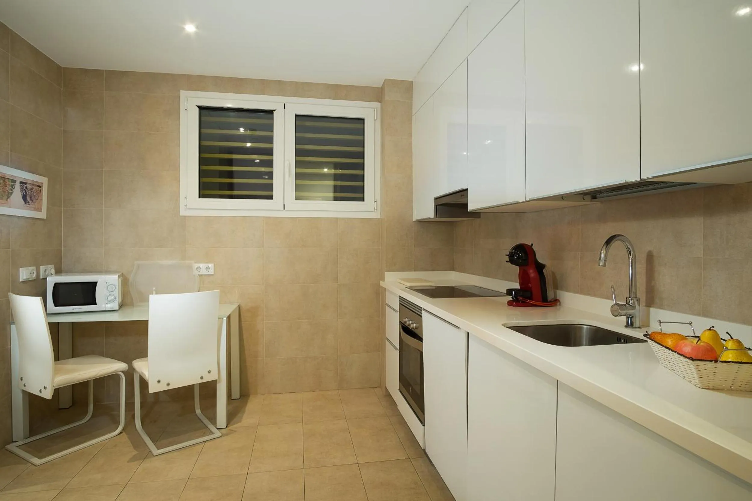Kitchen or kitchenette in Suites Puerto Sherry