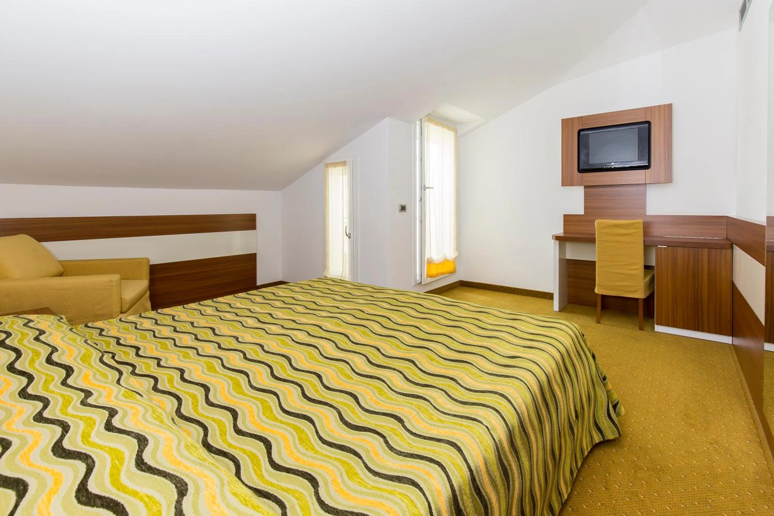 Bed in Hotel Maregolf