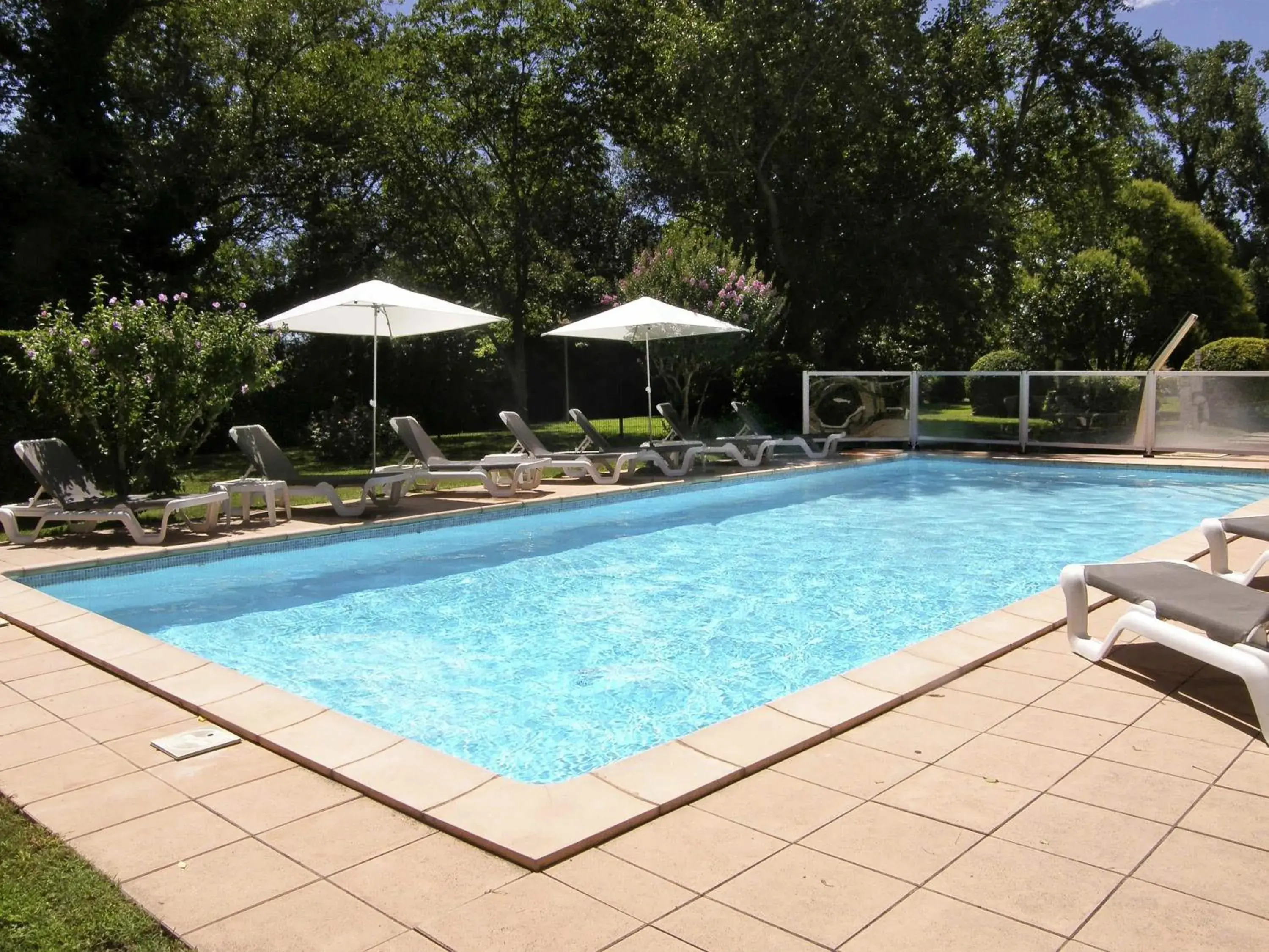 Pool view in Ibis Cavaillon Portes du Luberon Pool view in Ibis Cavaillon Portes du Luberon