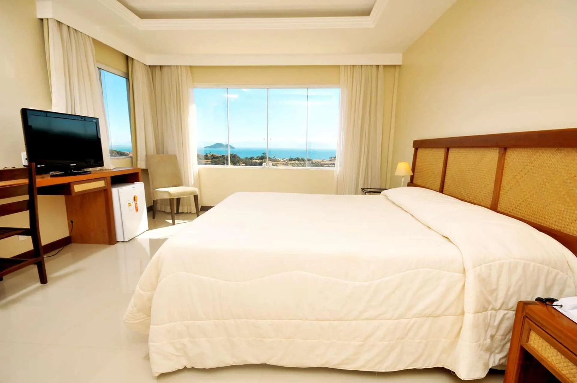 Bed in Pousada Pelicano