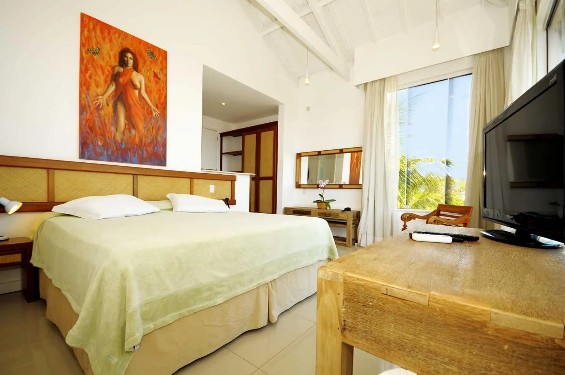 Bed in Pousada Pelicano