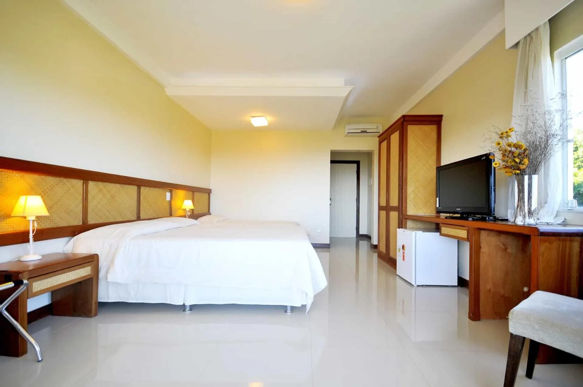 Bed in Pousada Pelicano