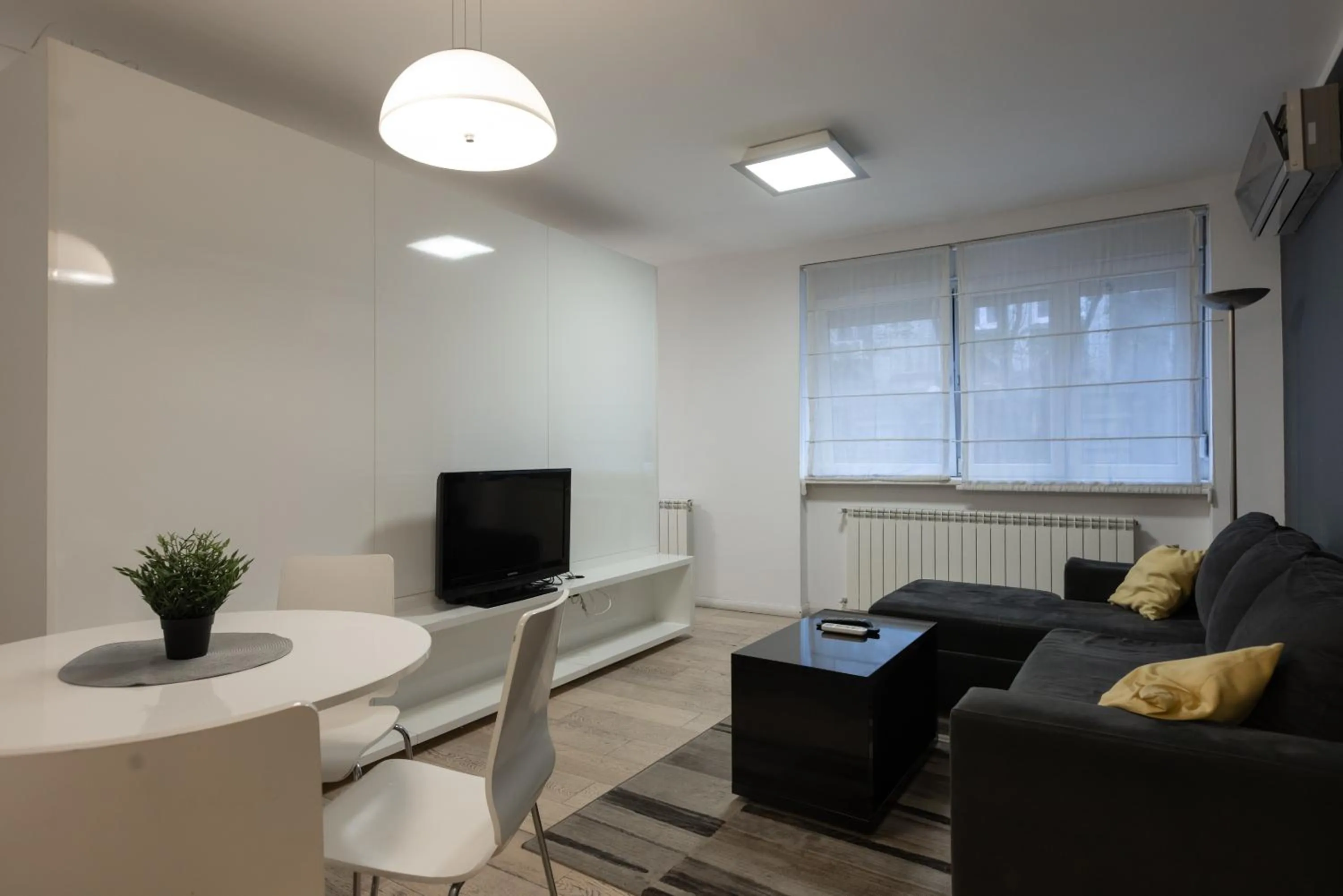 Living room in Central Park Apartments