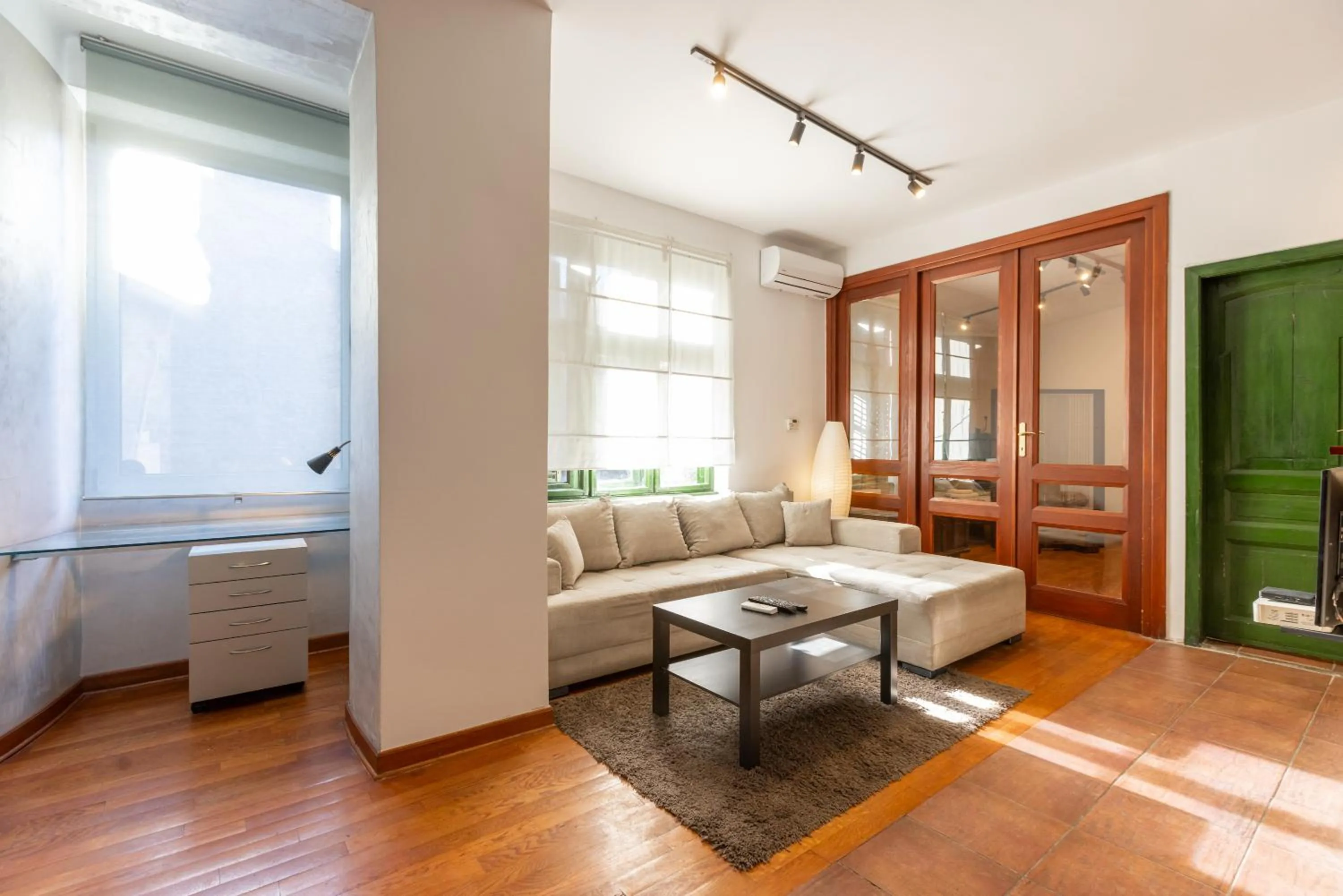 Living room, Bed in Central Park Apartments