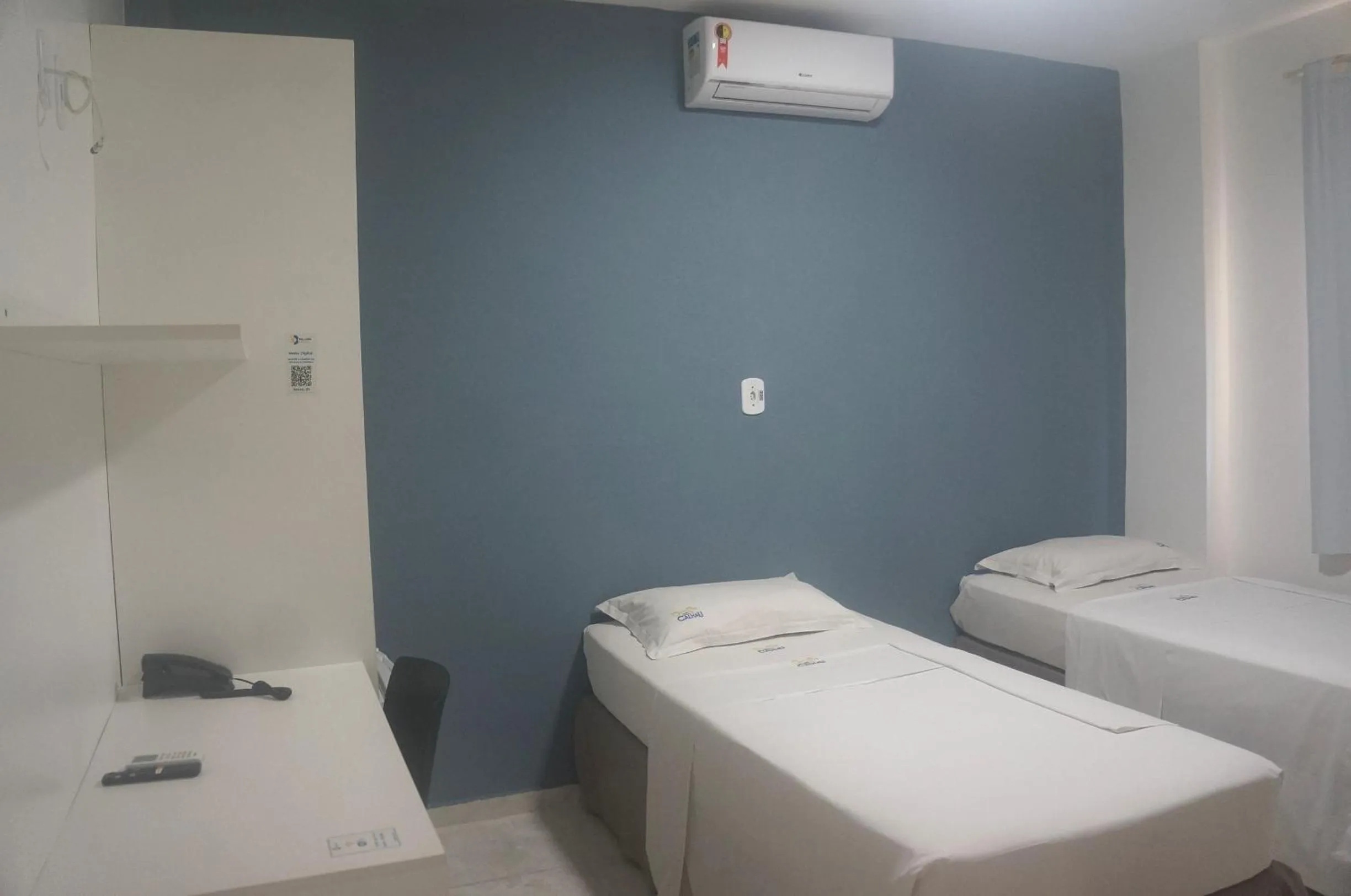 Bed in Belaris Hotel Executivo