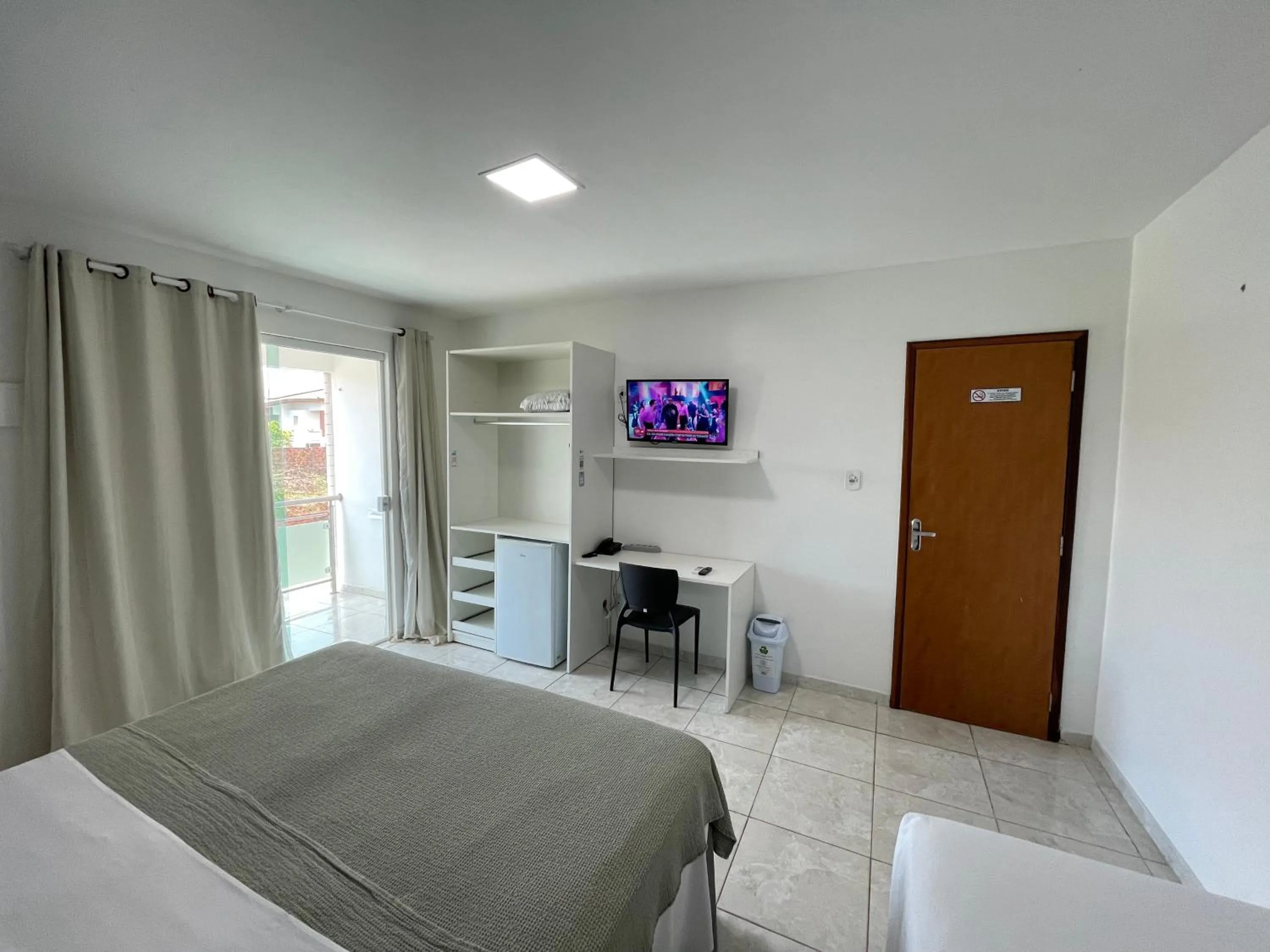 Bed in Belaris Hotel Executivo