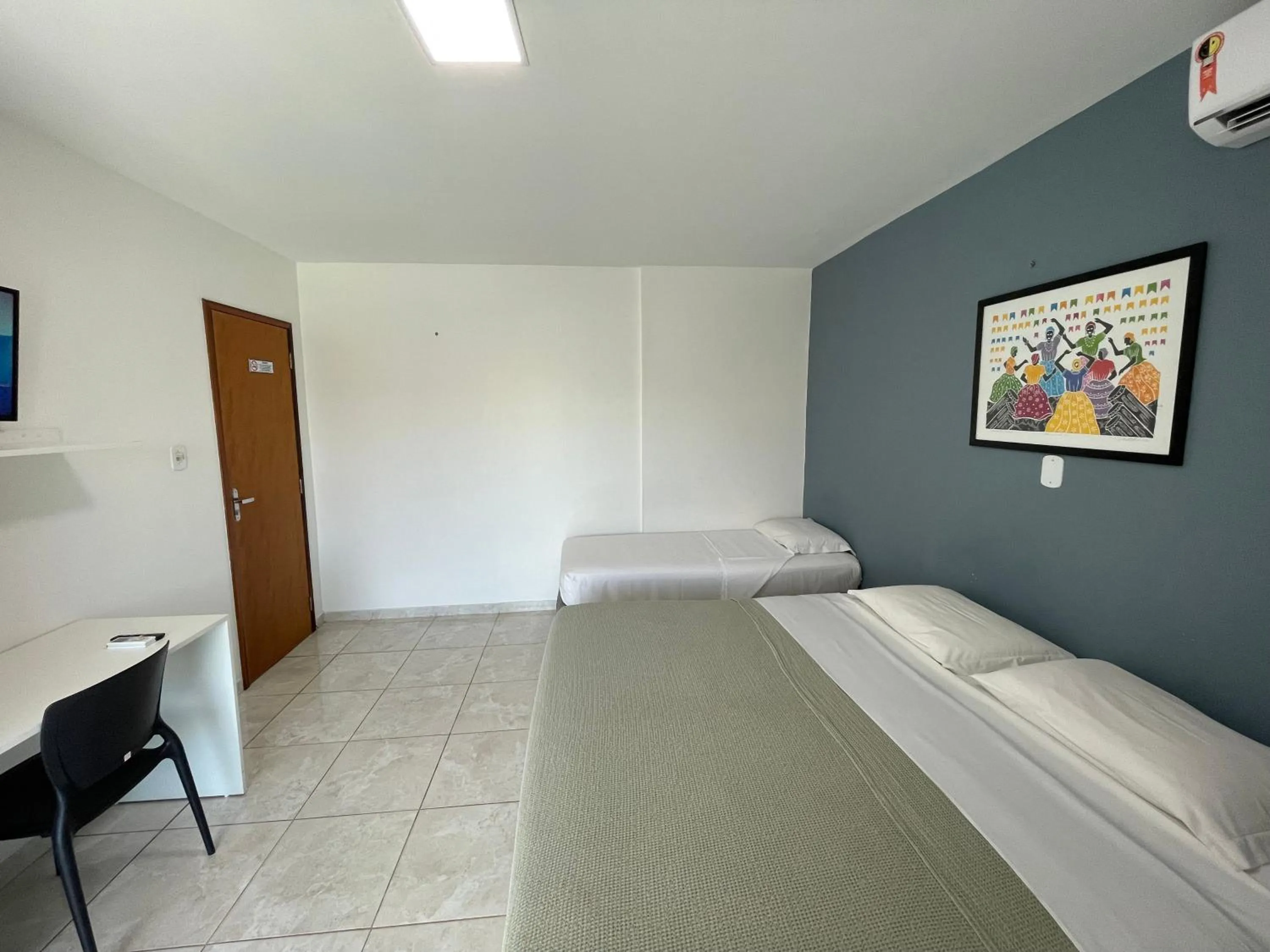 Bed in Belaris Hotel Executivo