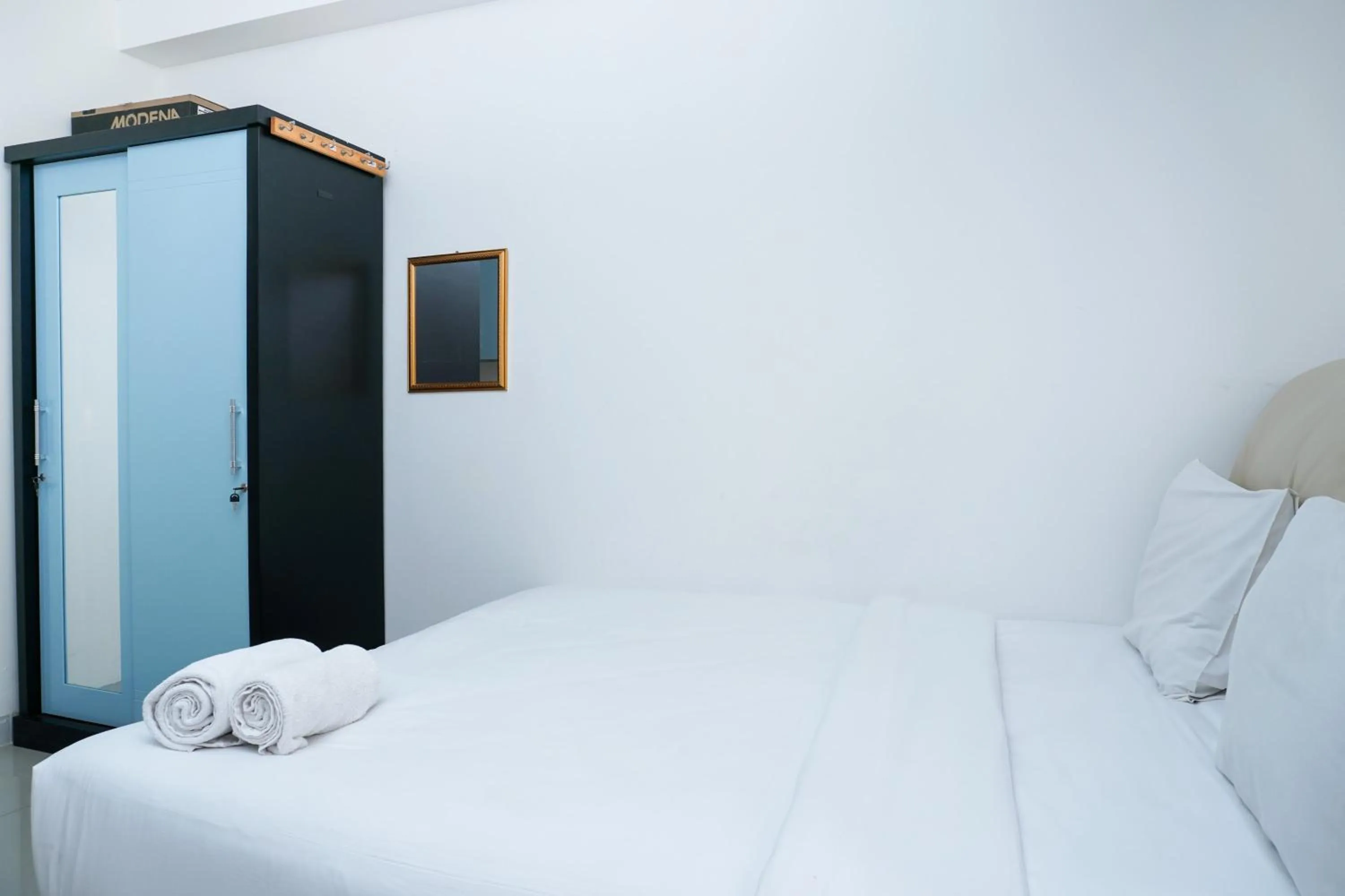 Bed in City View Studio Apartment at Signature Park Grande By Travelio