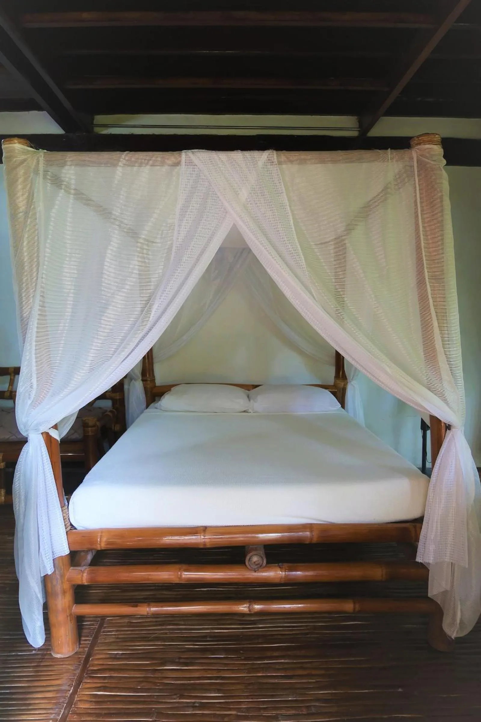 Bed in VILLA MARMARINE BEACH RESORT & RESTAURANT