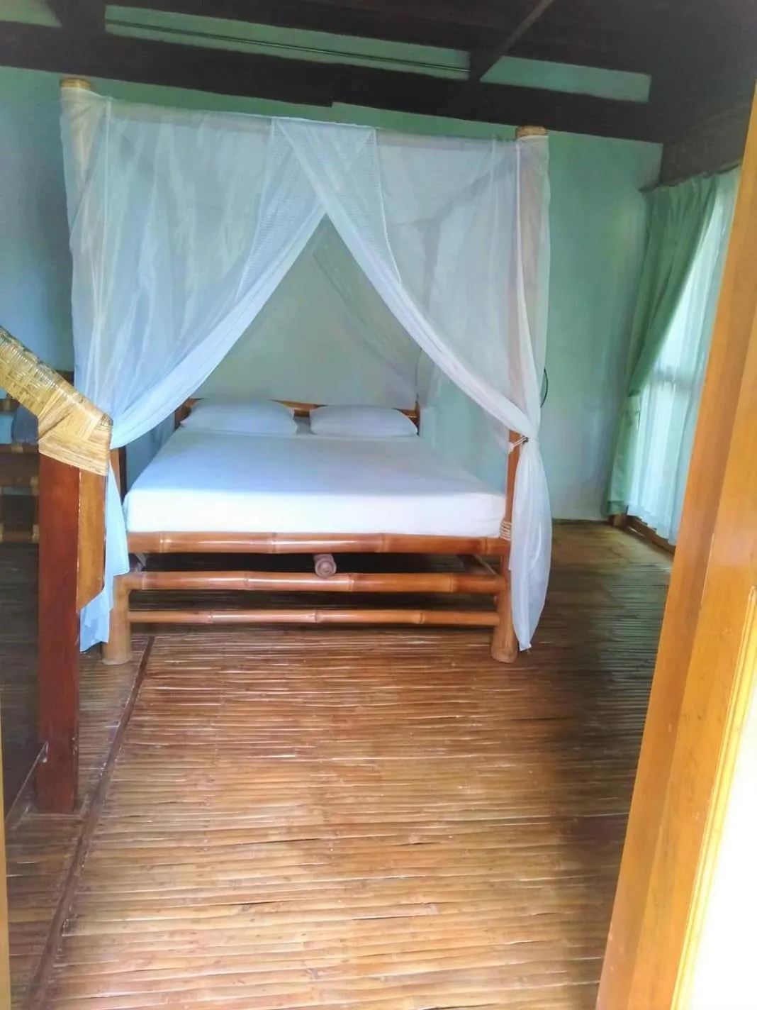 Bed in VILLA MARMARINE BEACH RESORT & RESTAURANT