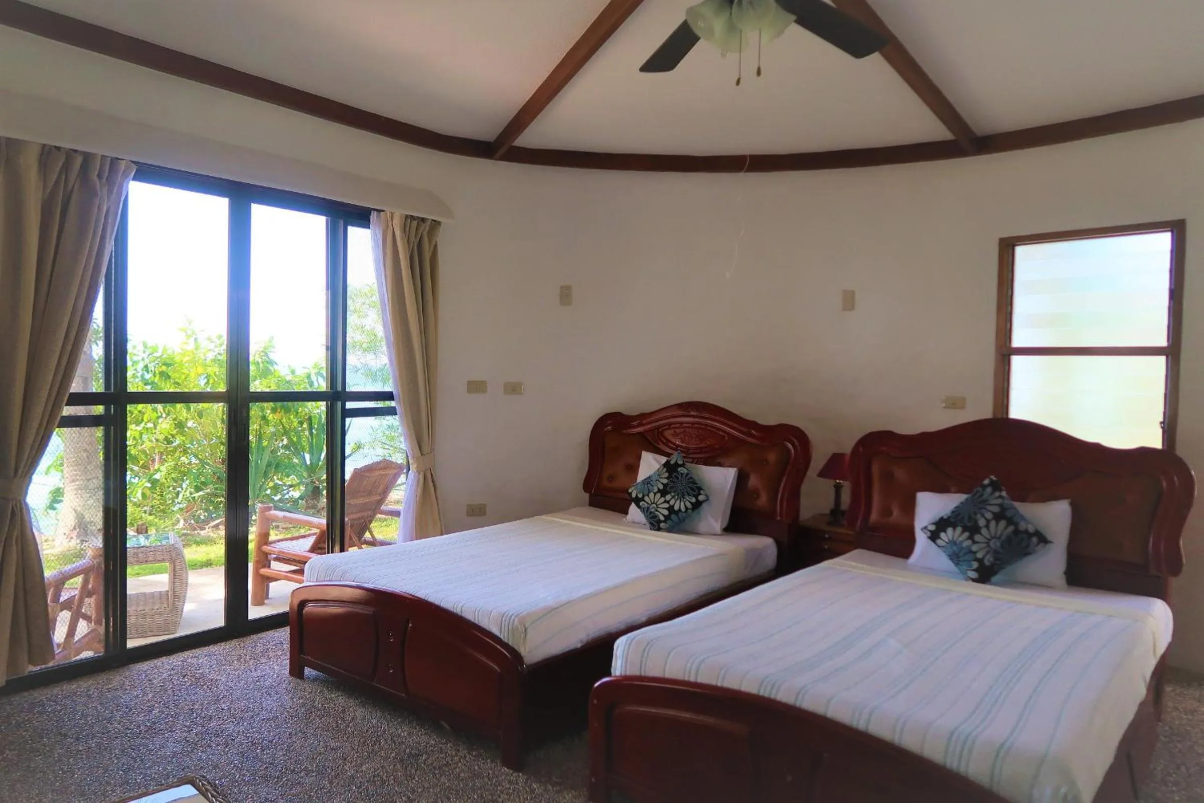 Bed in VILLA MARMARINE BEACH RESORT & RESTAURANT