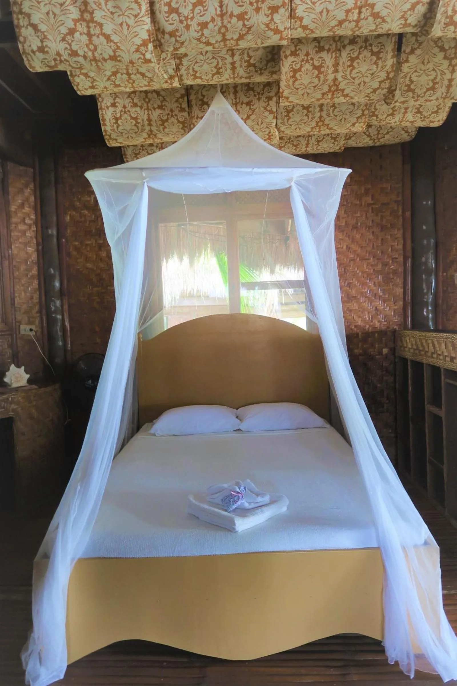 Bed in VILLA MARMARINE BEACH RESORT & RESTAURANT