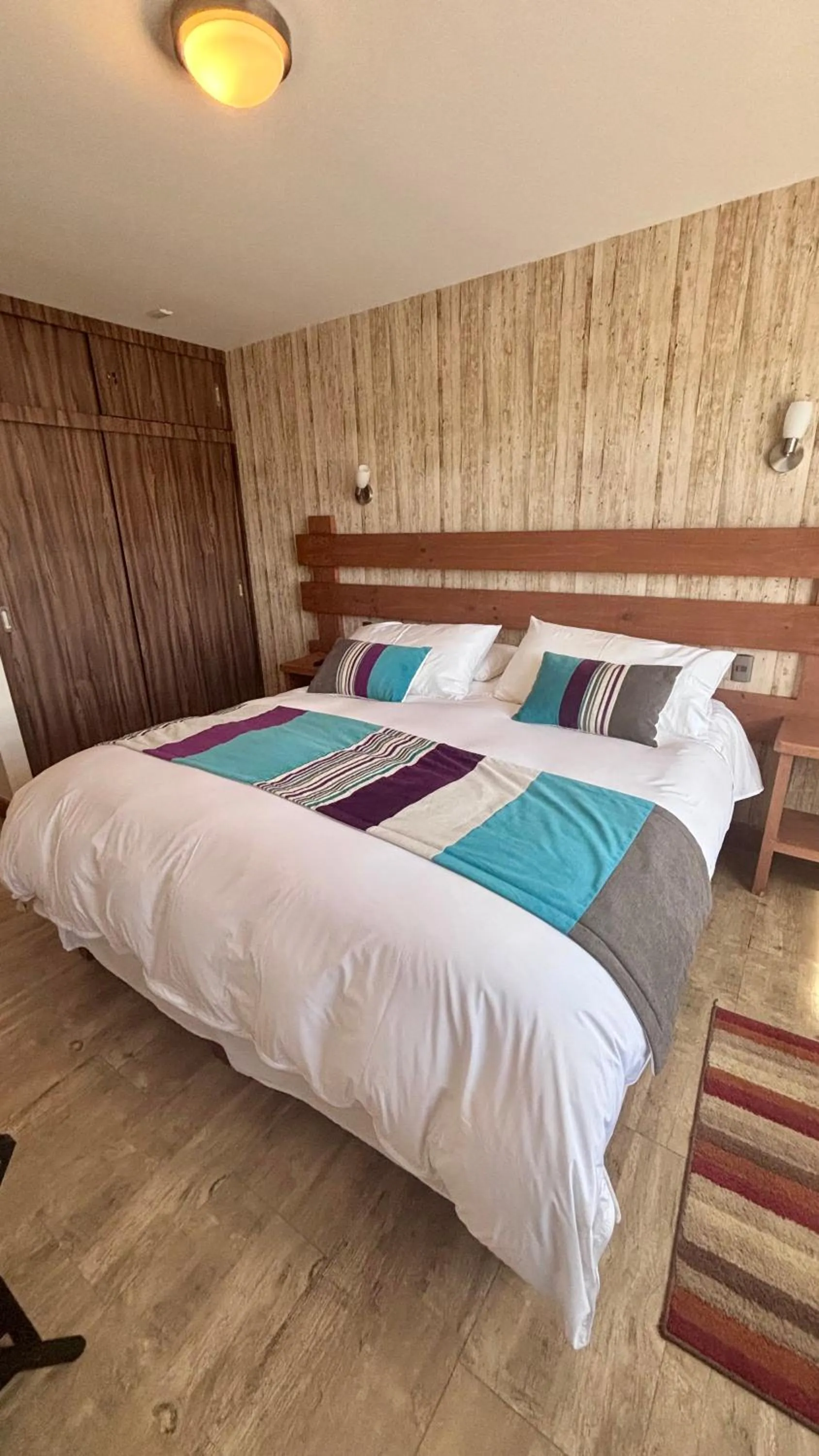 Bed in Entre Cumbres Apart Hotel