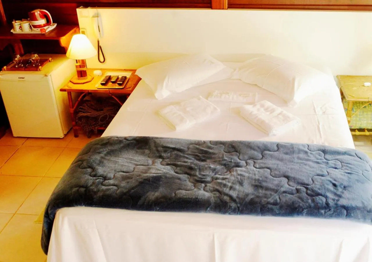 Bed in Pousada Encontro dos Rios