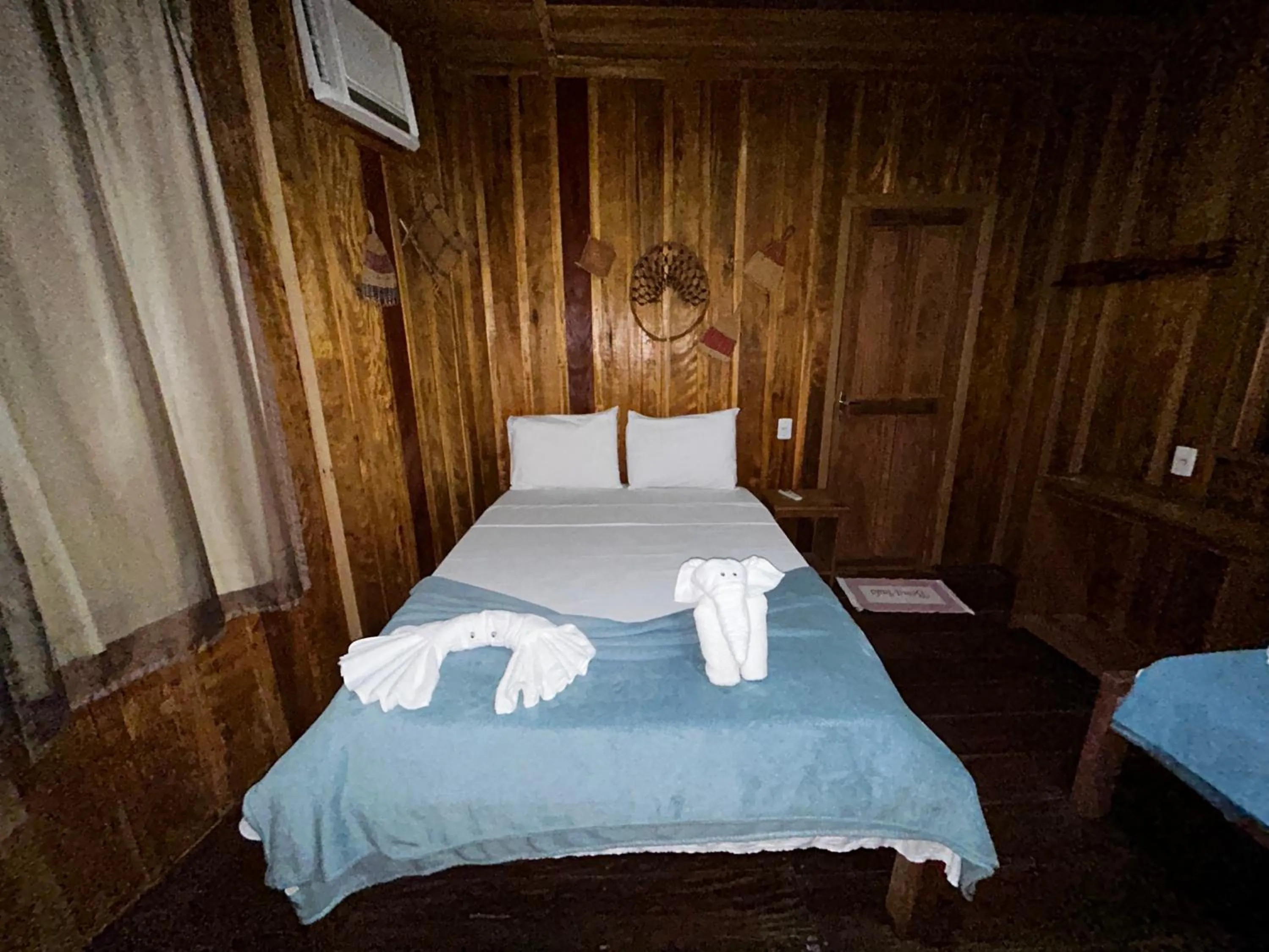 Bed in Vista do Lago Jungle Lodge