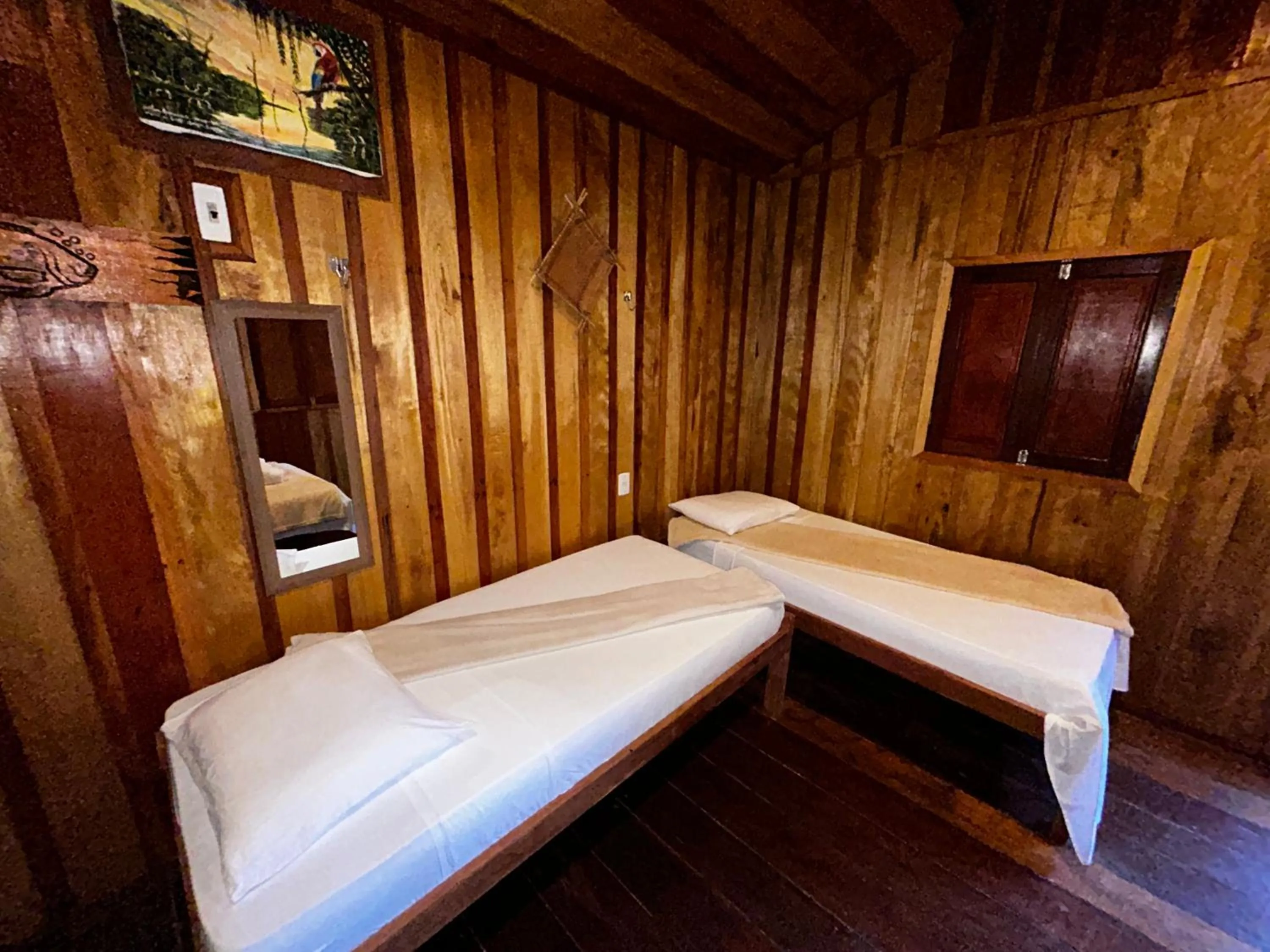 Bed in Vista do Lago Jungle Lodge