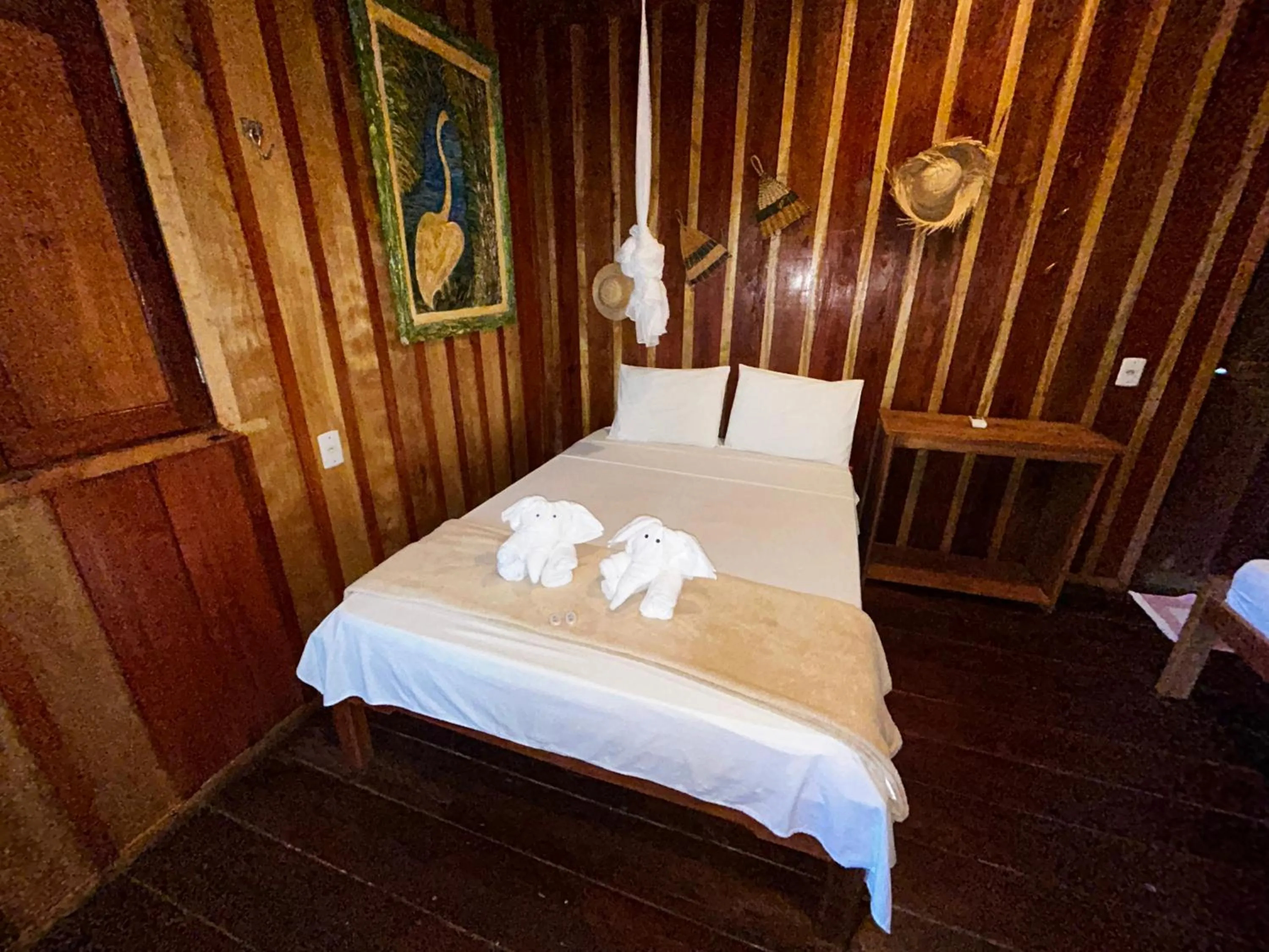 Bed in Vista do Lago Jungle Lodge