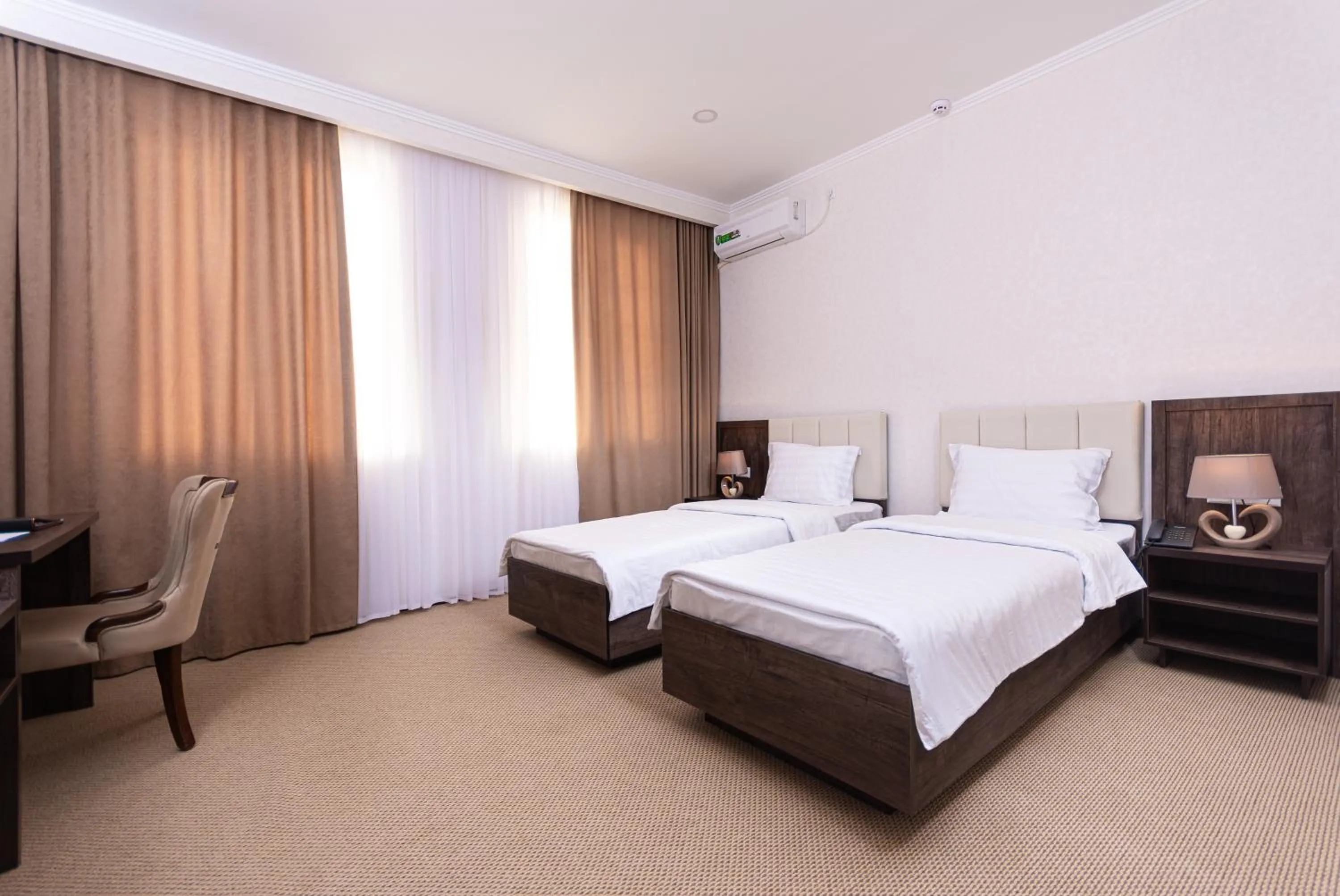 Bed in Grand Fergana Hotel