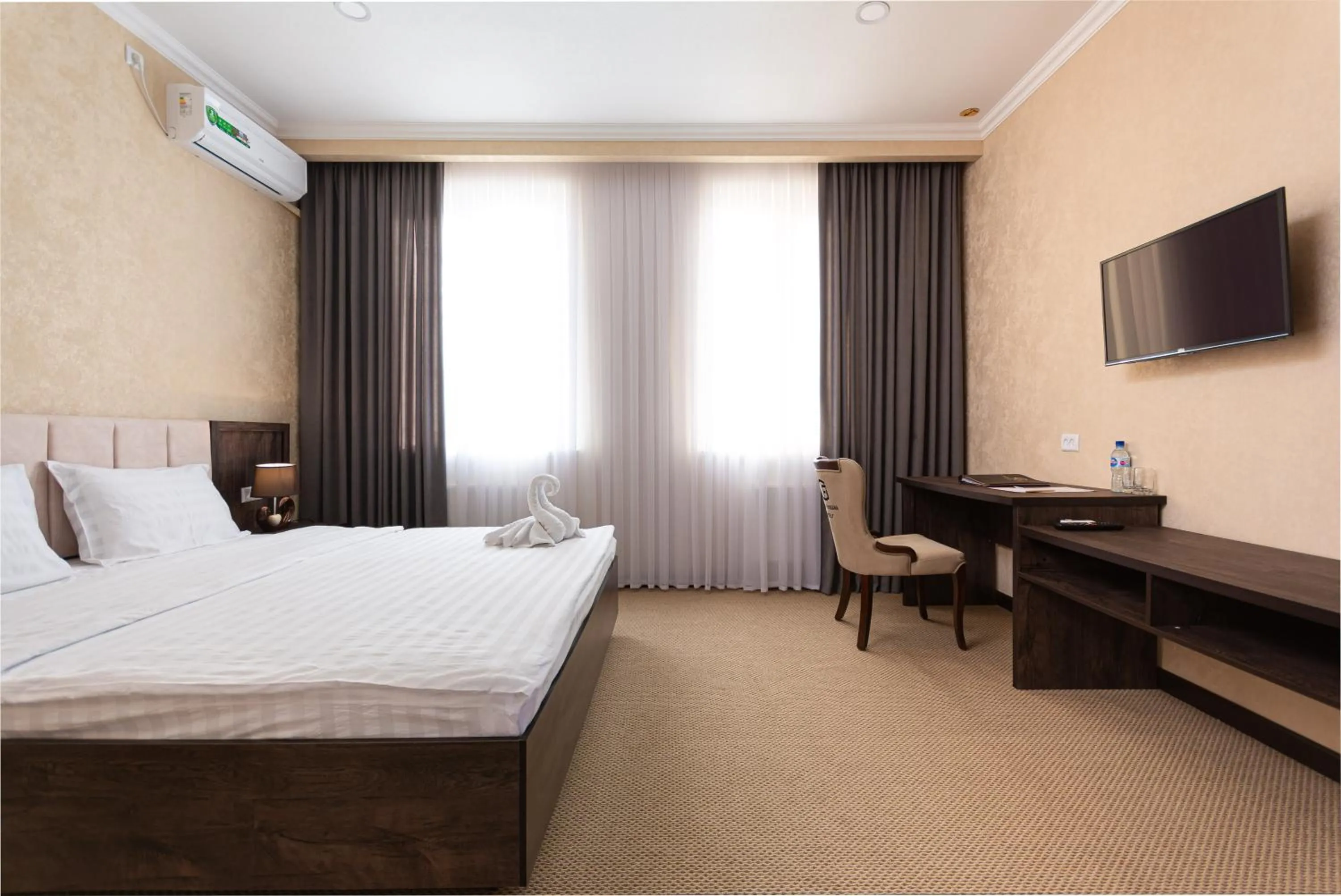 Bed in Grand Fergana Hotel