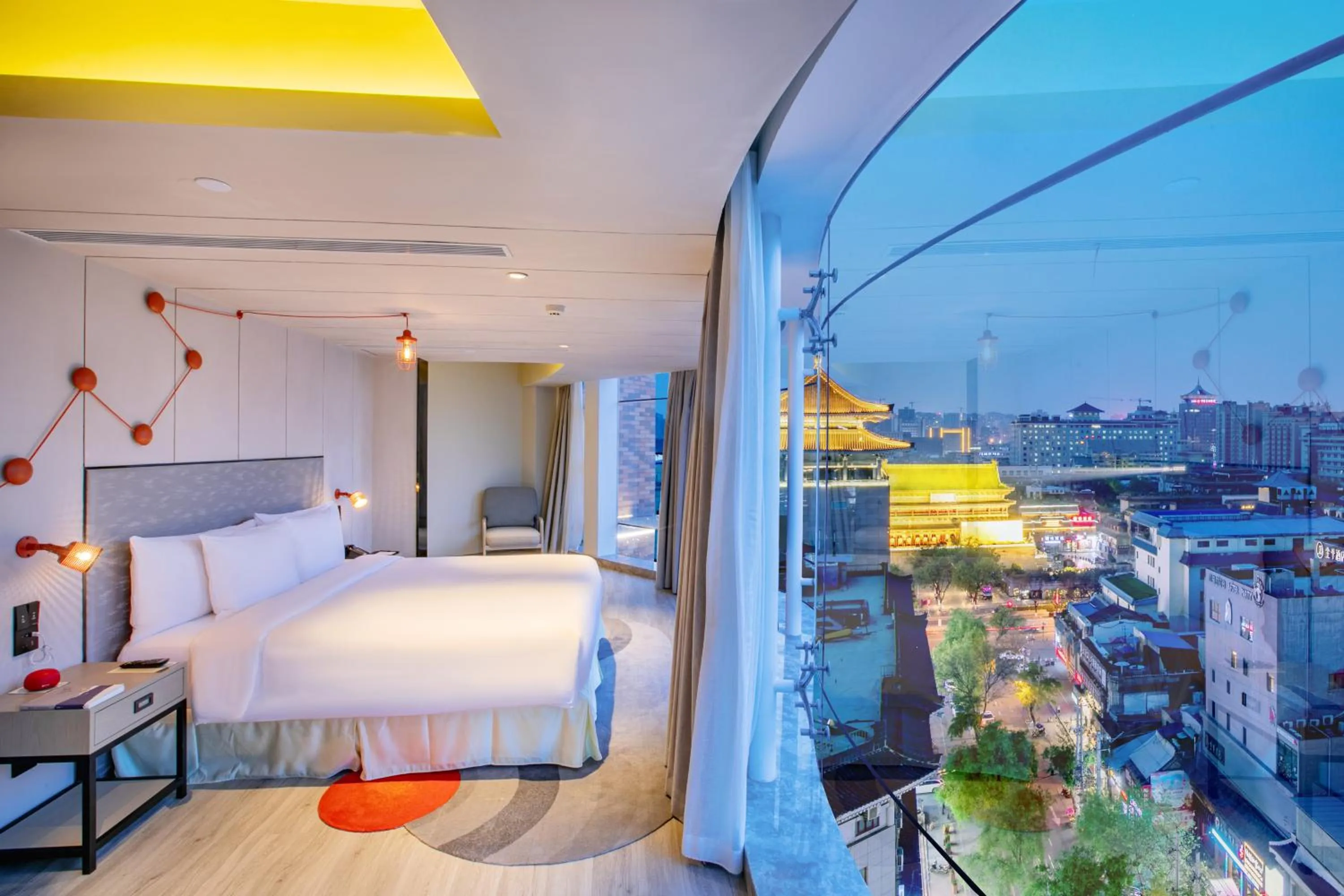 Bed in Jinmao Hotel Xi'an Downtown ( Bell & Drum Tower)