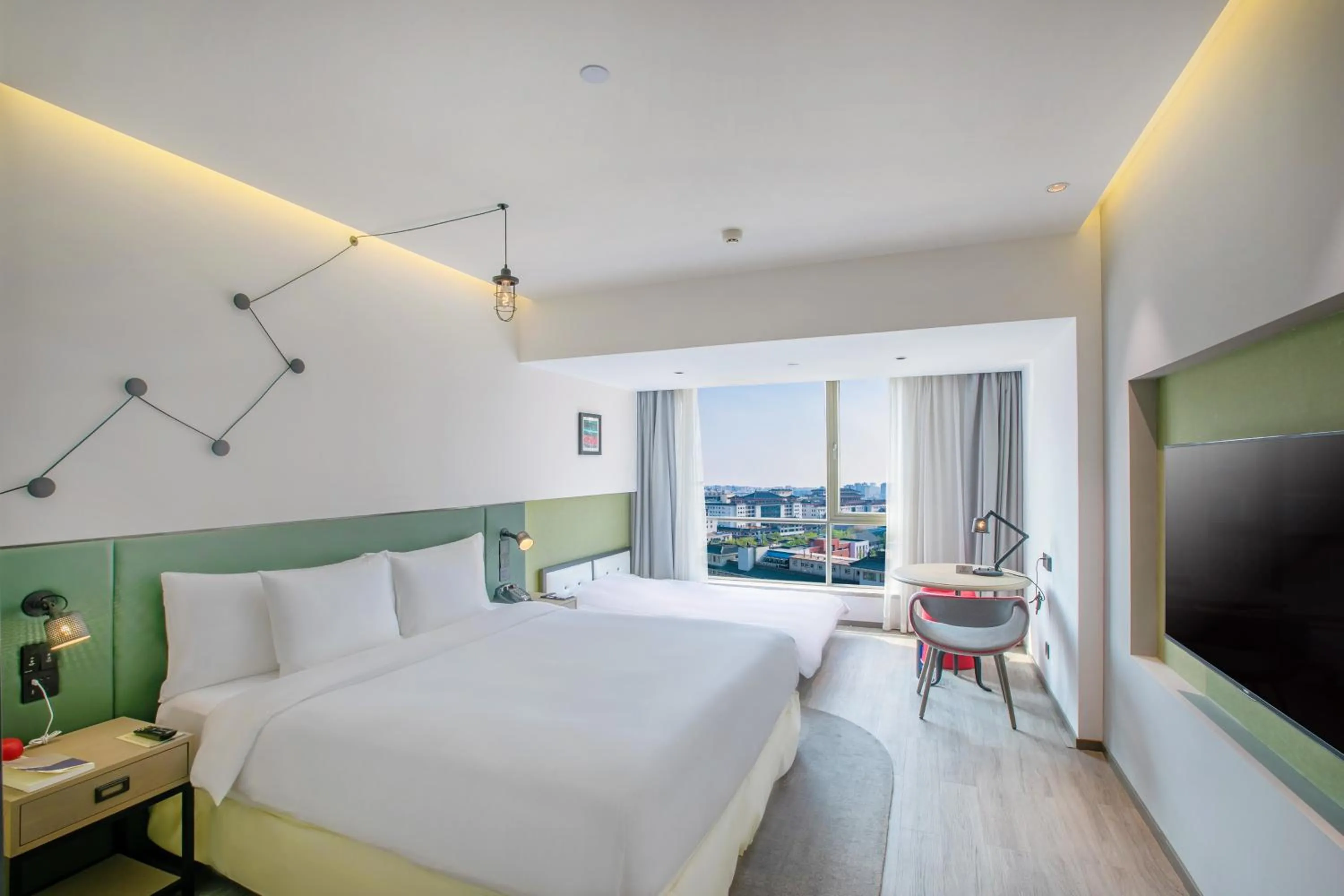 Bed in Jinmao Hotel Xi'an Downtown ( Bell & Drum Tower)