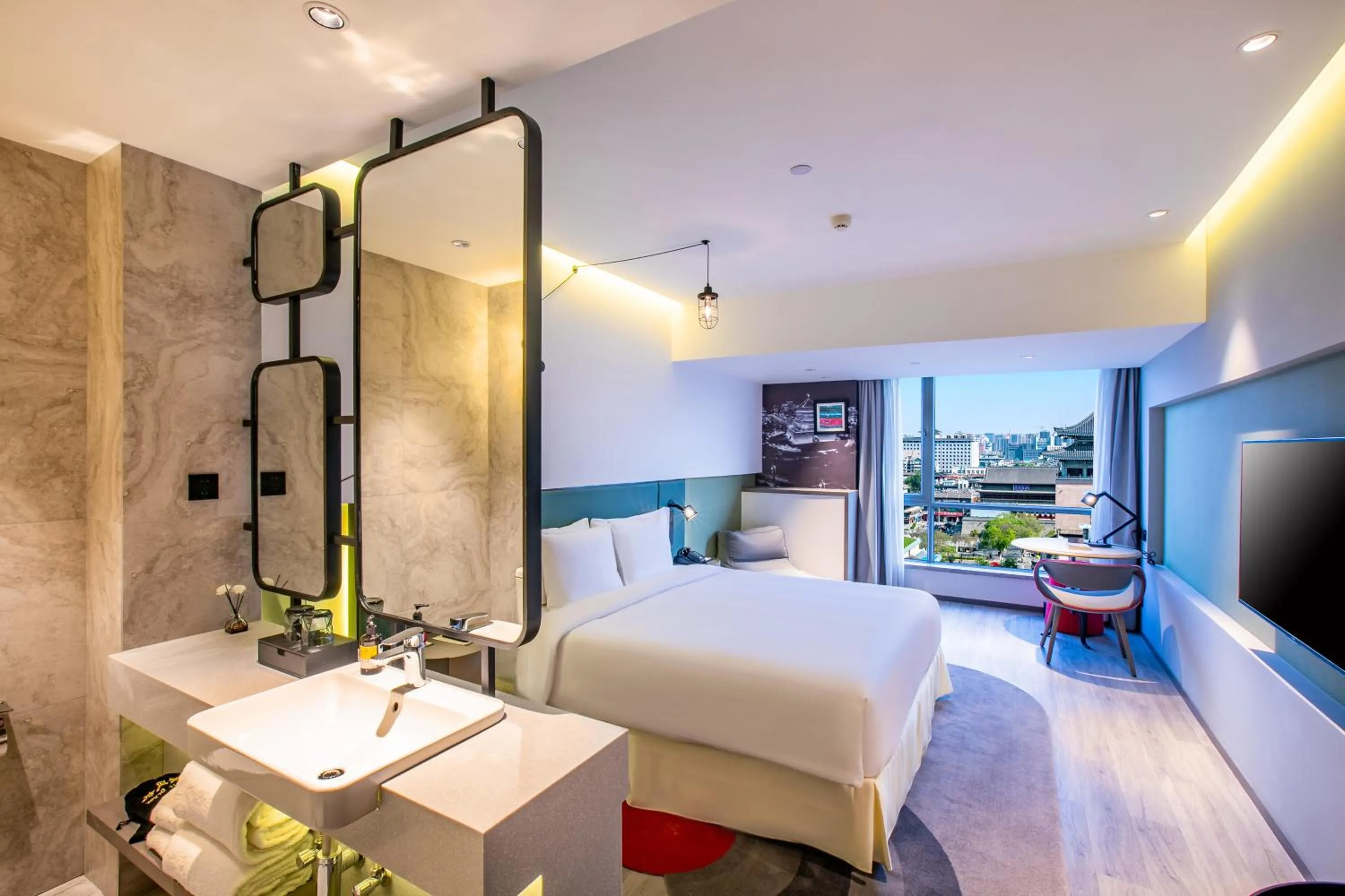 Bed in Jinmao Hotel Xi'an Downtown ( Bell & Drum Tower)