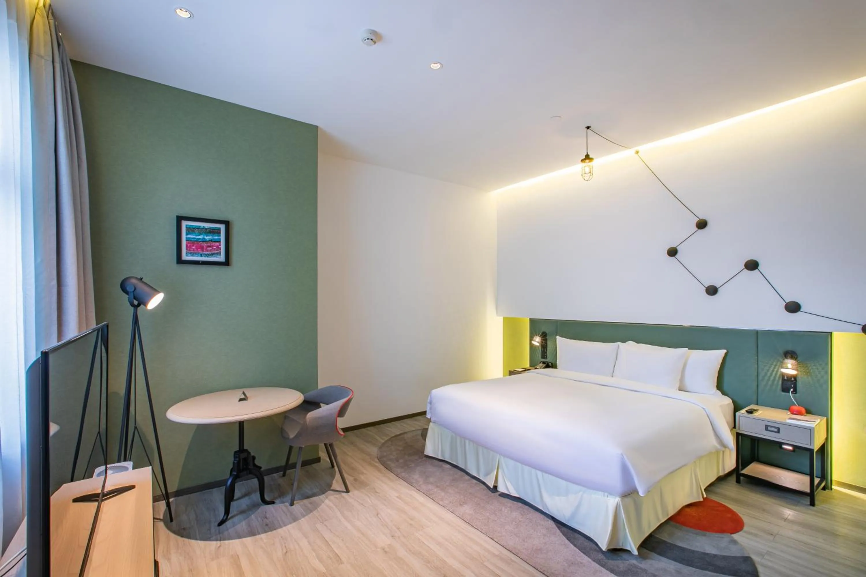 Bed in Jinmao Hotel Xi'an Downtown ( Bell & Drum Tower)