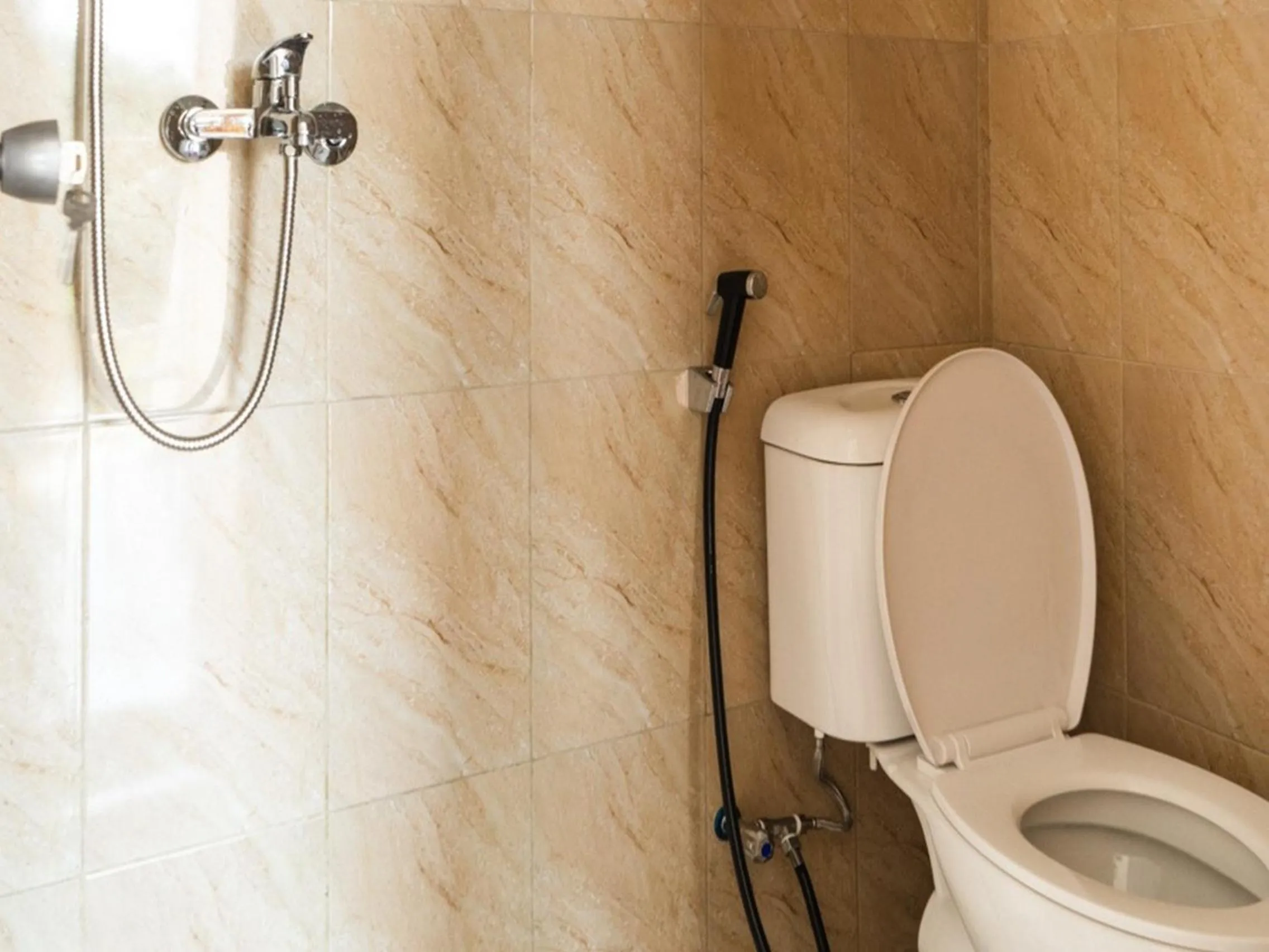 Bathroom in RedDoorz near Cipinang Indah Mall