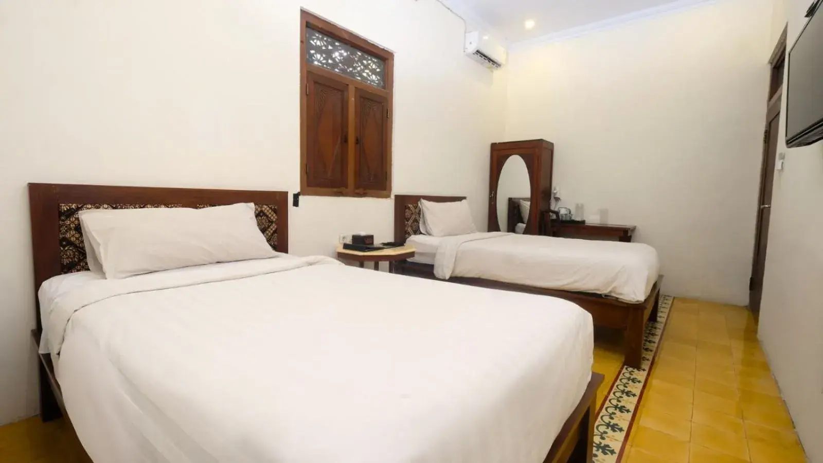 Bed in The Mangkoro Hotel by Sinergi Bed in The Mangkoro Hotel by Sinergi