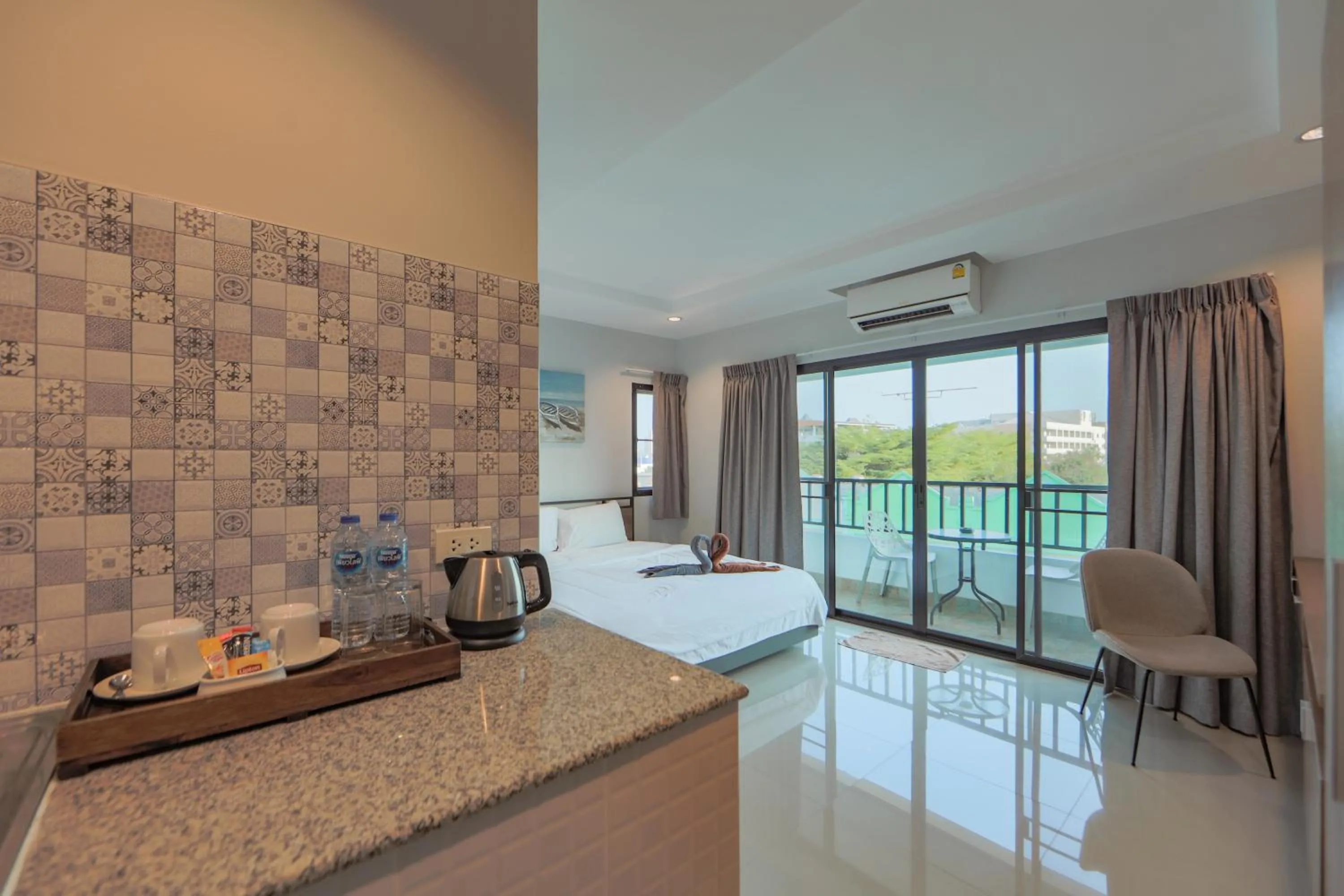 Kitchen or kitchenette in Nalanta Hotel Pattaya