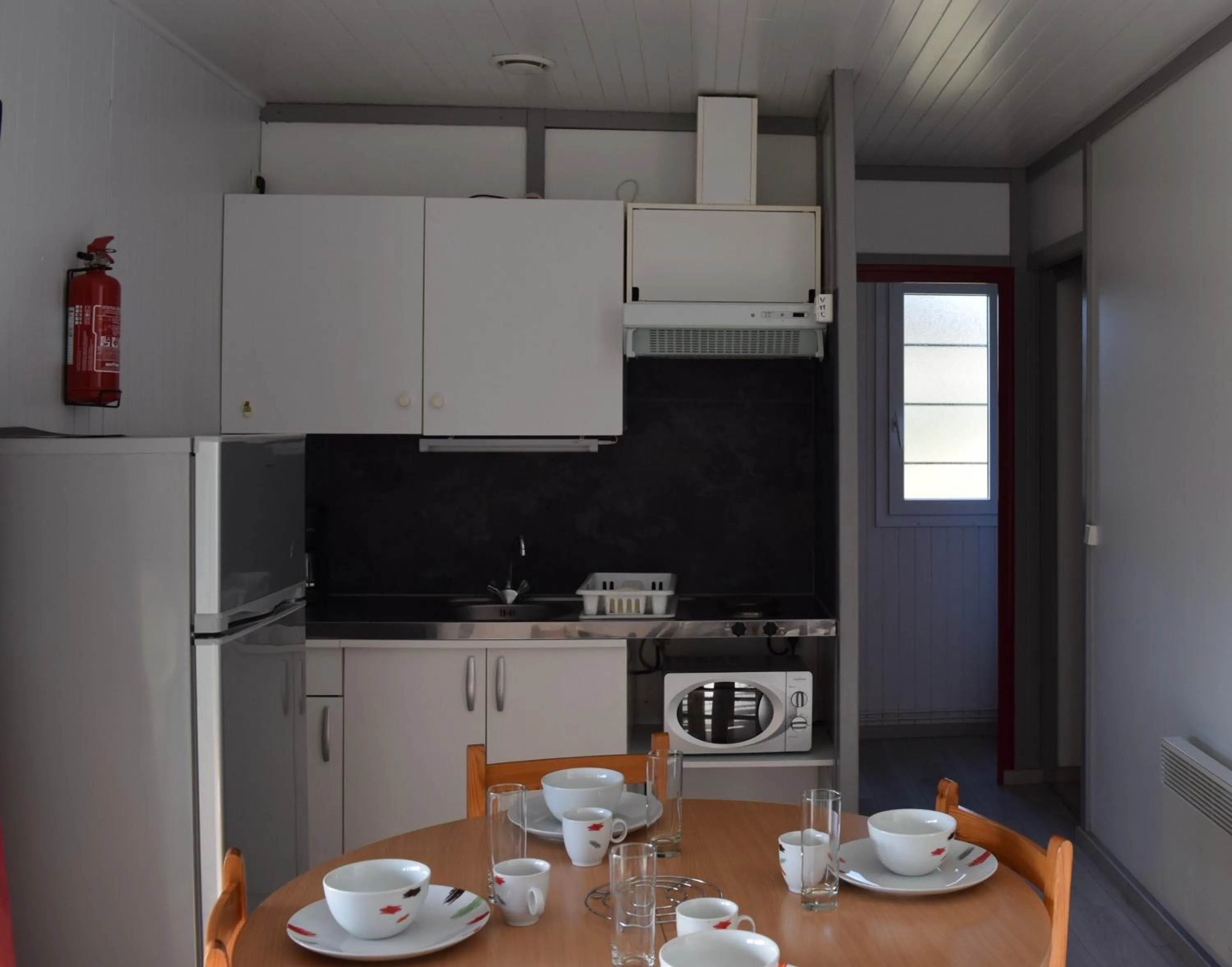 Kitchen or kitchenette in Camping - Village Vacances du Lac