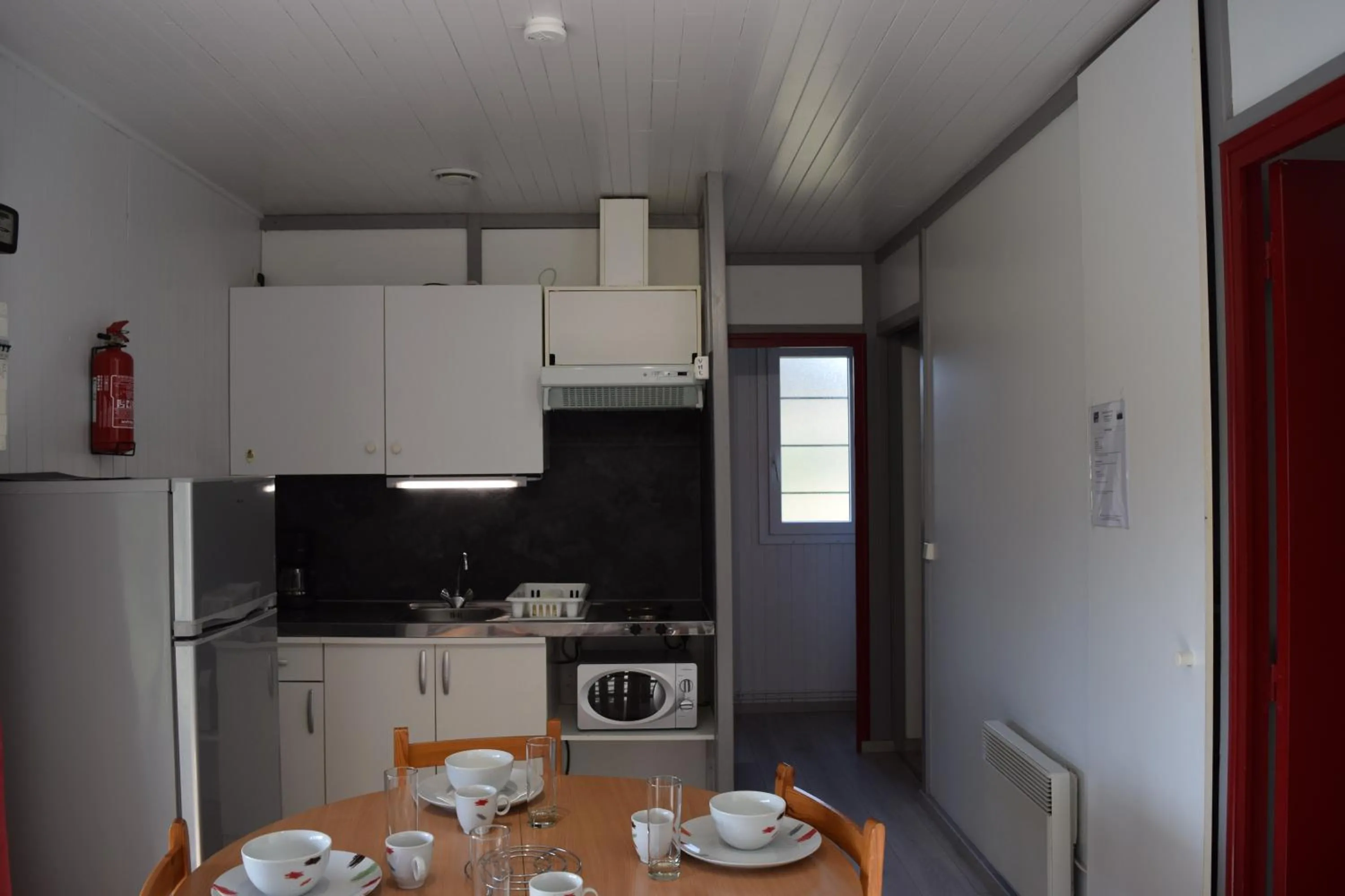 Kitchen or kitchenette in Camping - Village Vacances du Lac