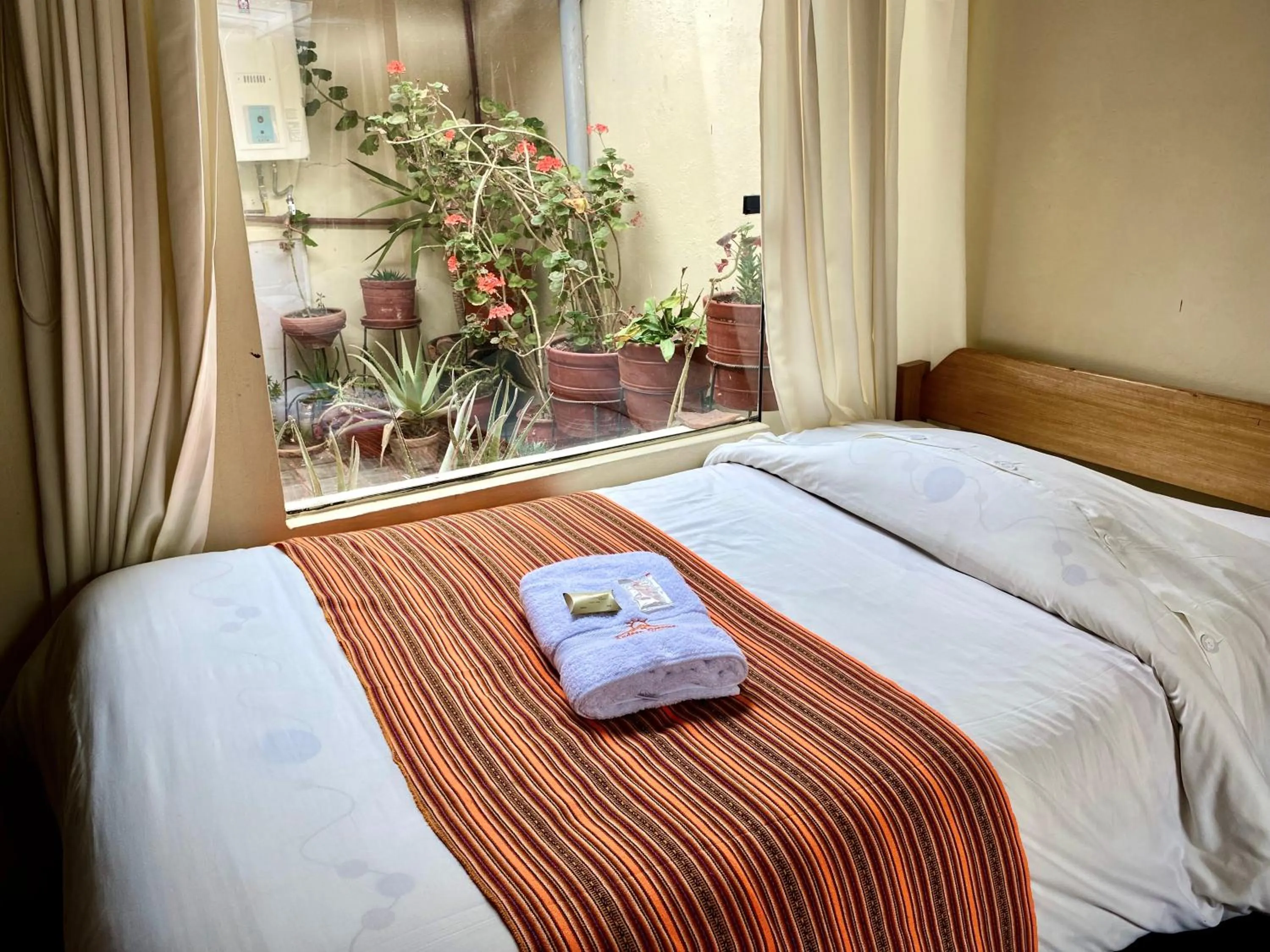 Bed in Andean Dreams Hotel