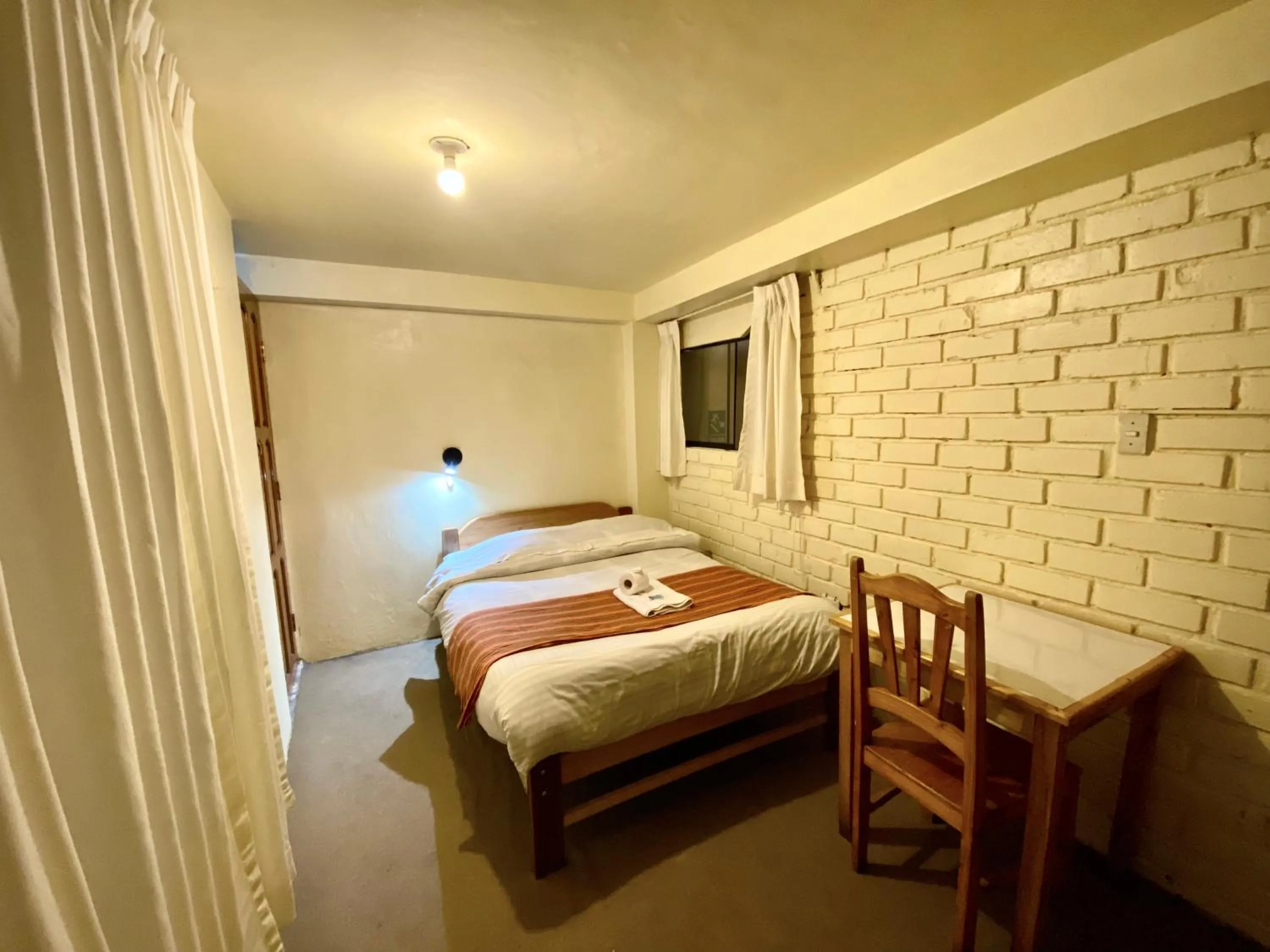 Bed in Andean Dreams Hotel