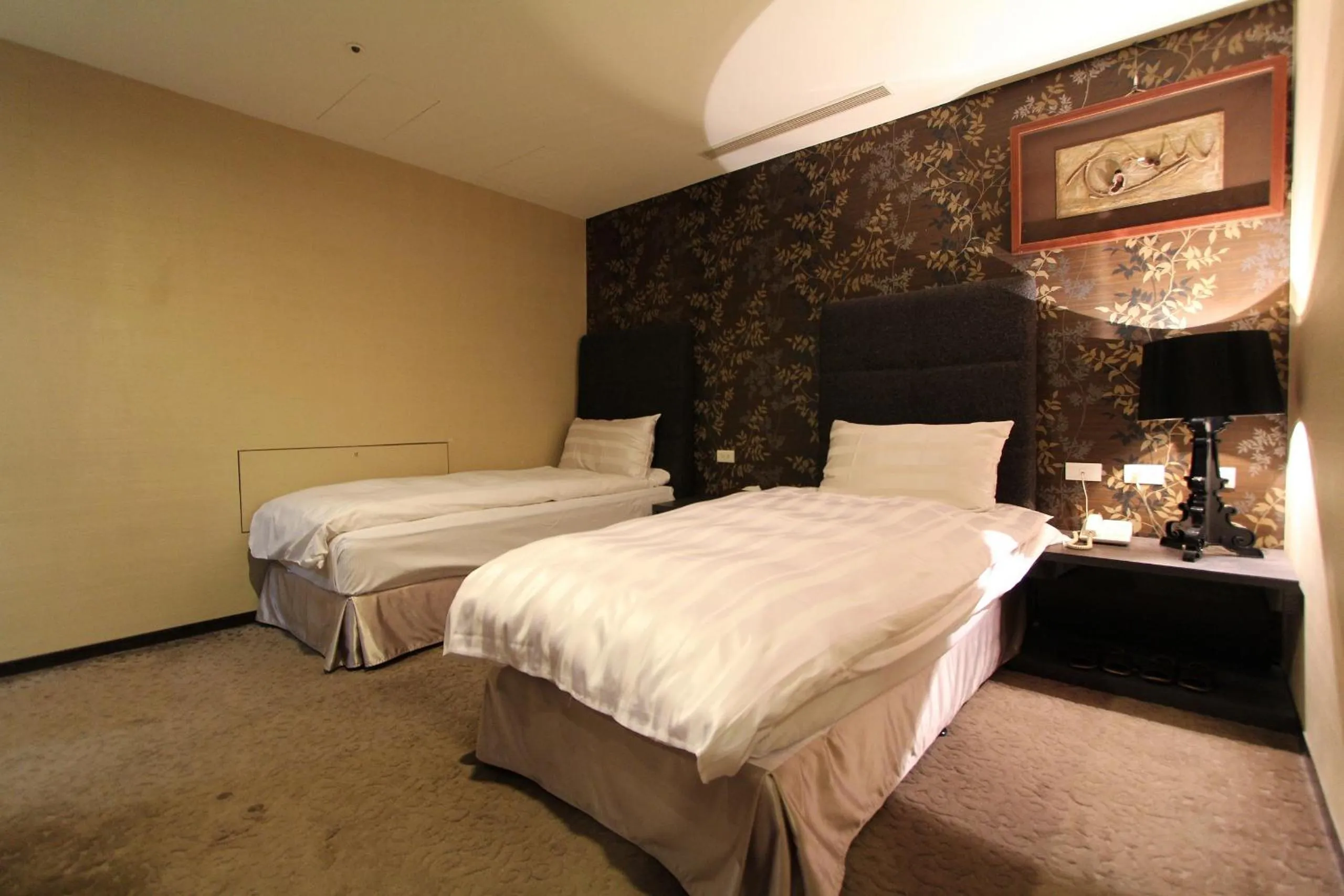 Bed in Shan-Yue Hotspring Hotel