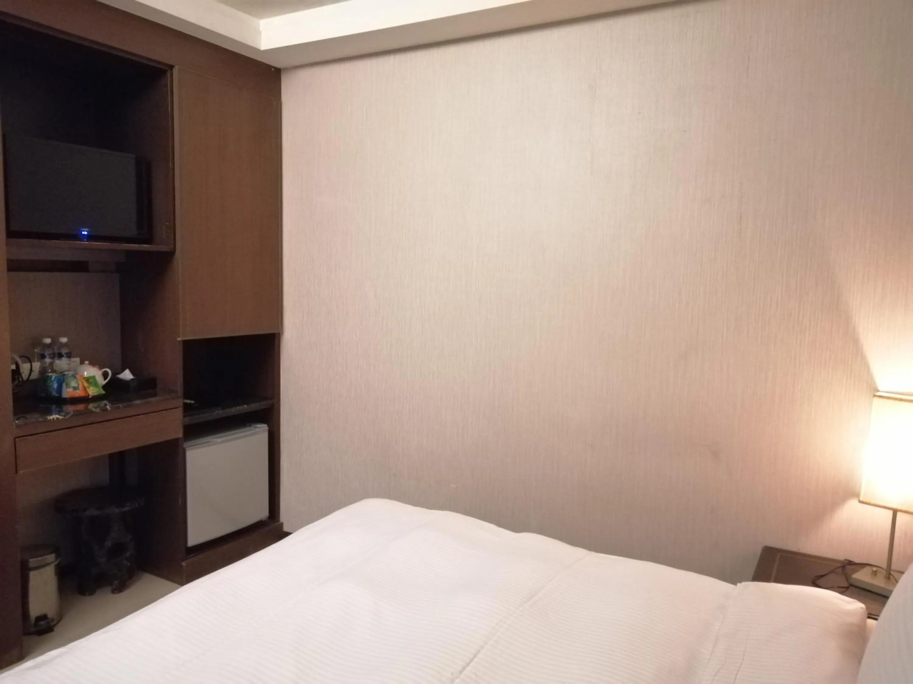 Bed in Shan-Yue Hotspring Hotel