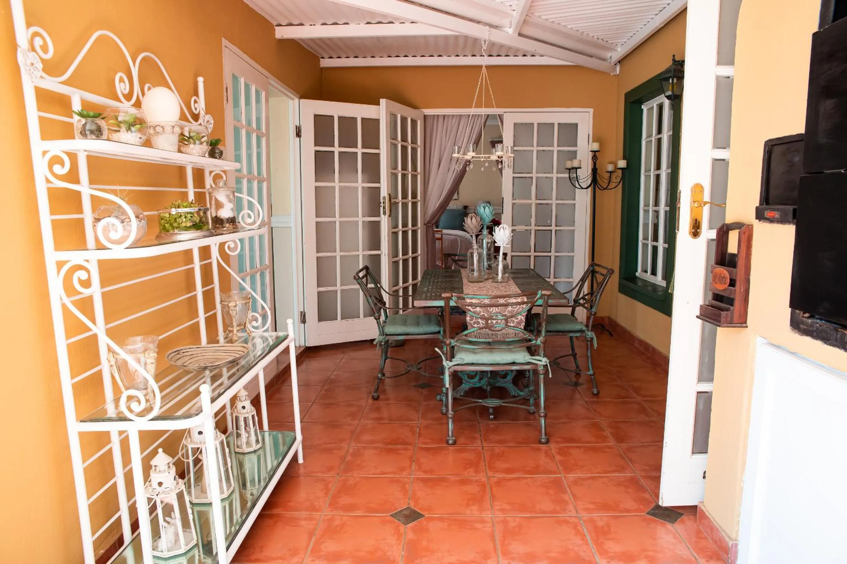 Patio in Roses and Pebbles B & B Guest House