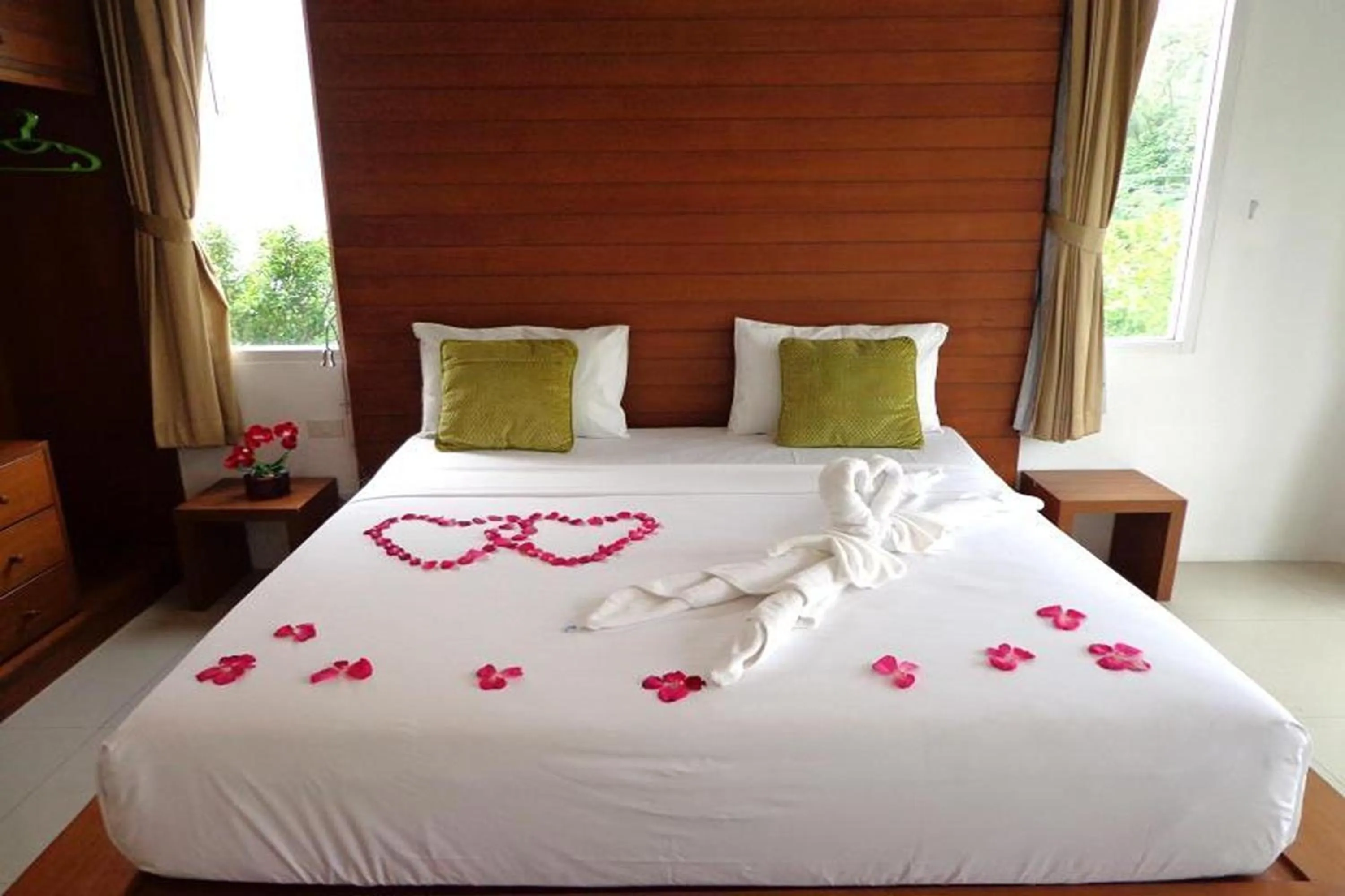 Bed in Sukcheewa Residence Phuket